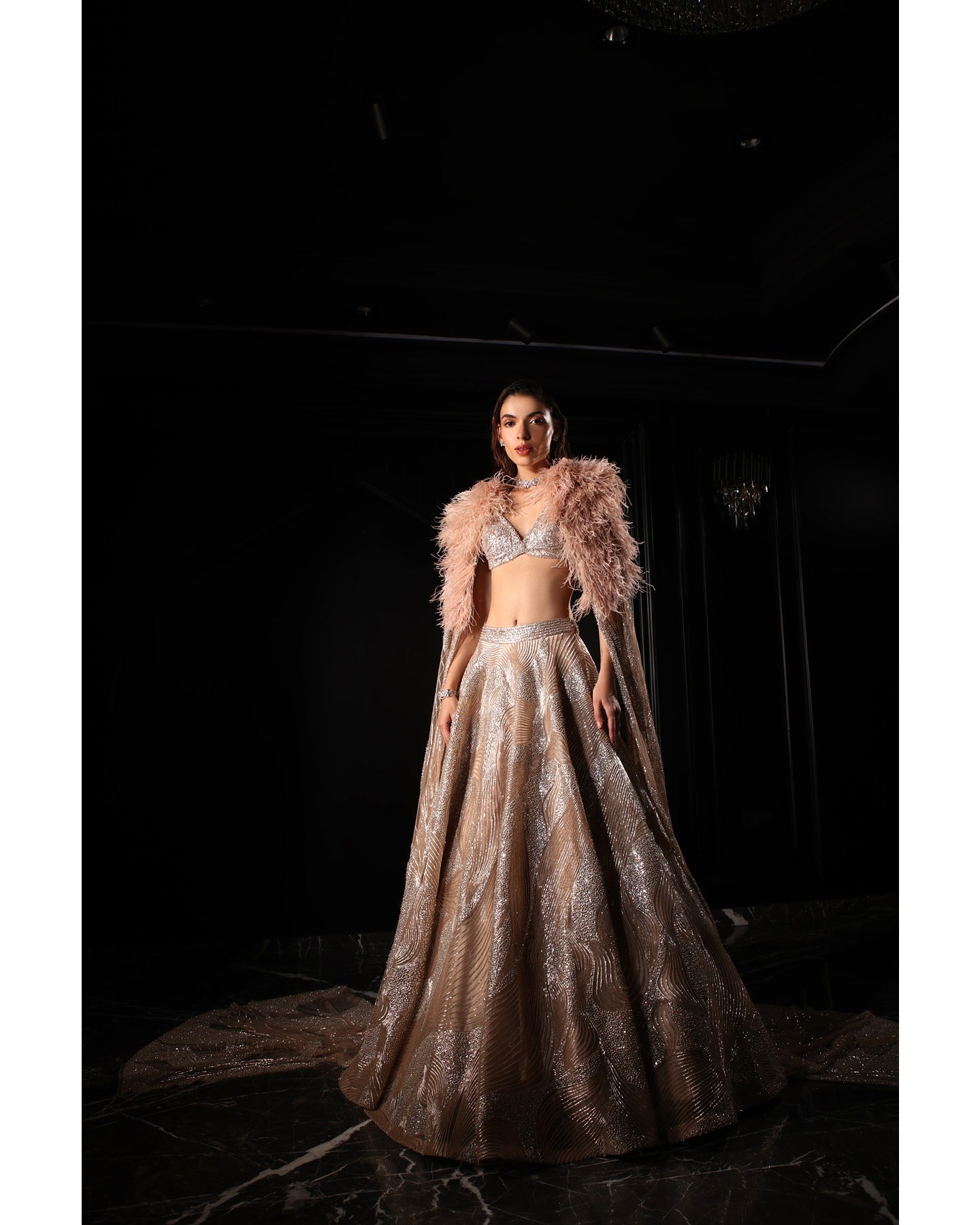 Elegance in every detail—our Light Coffee Brown Lehenga adorned with stones, crystals, sequins, and Japanese cut-dana creates a captivating symphony of sophistication.