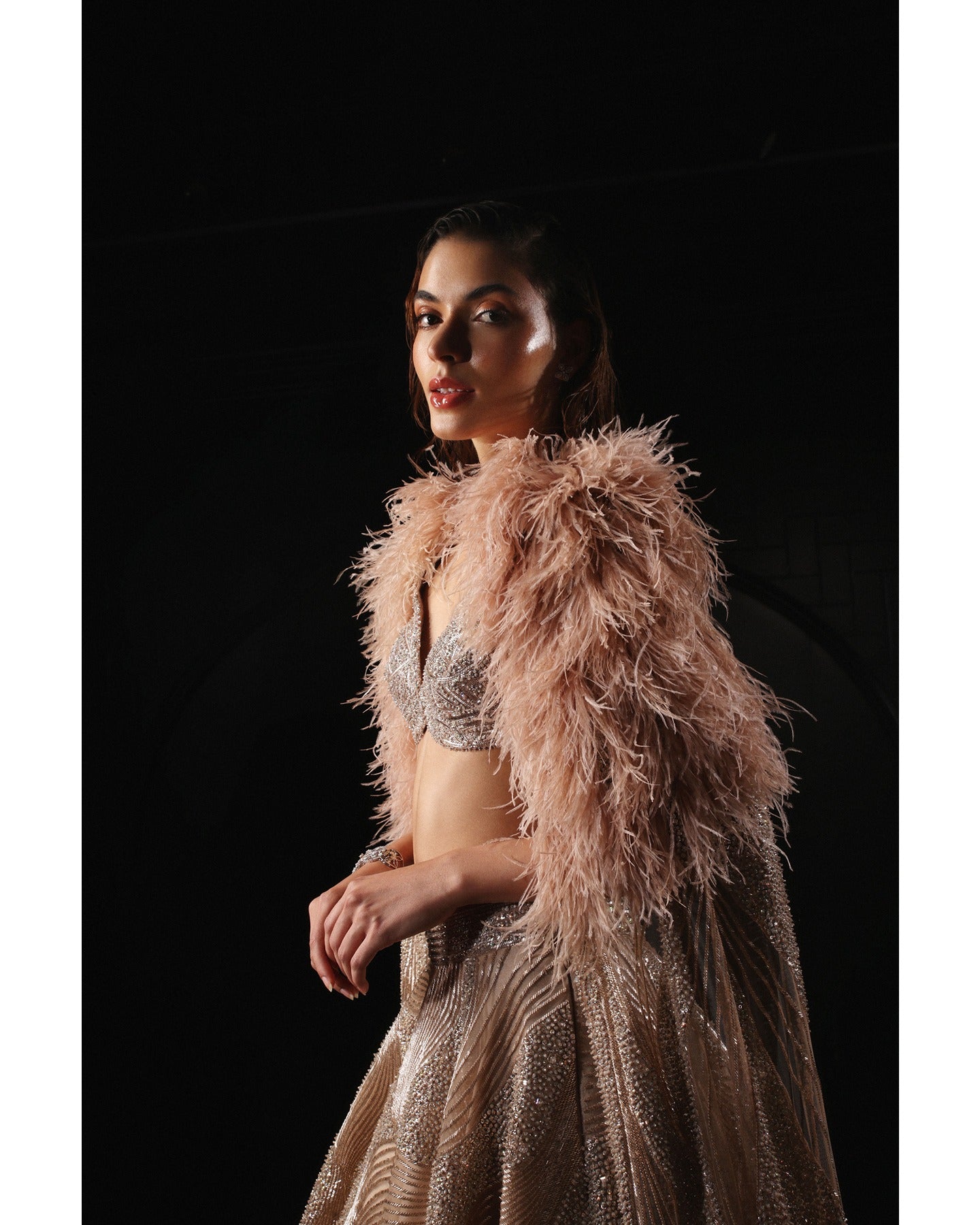 Elegance in every detail—our Light Coffee Brown Lehenga adorned with stones, crystals, sequins, and Japanese cut-dana creates a captivating symphony of sophistication.