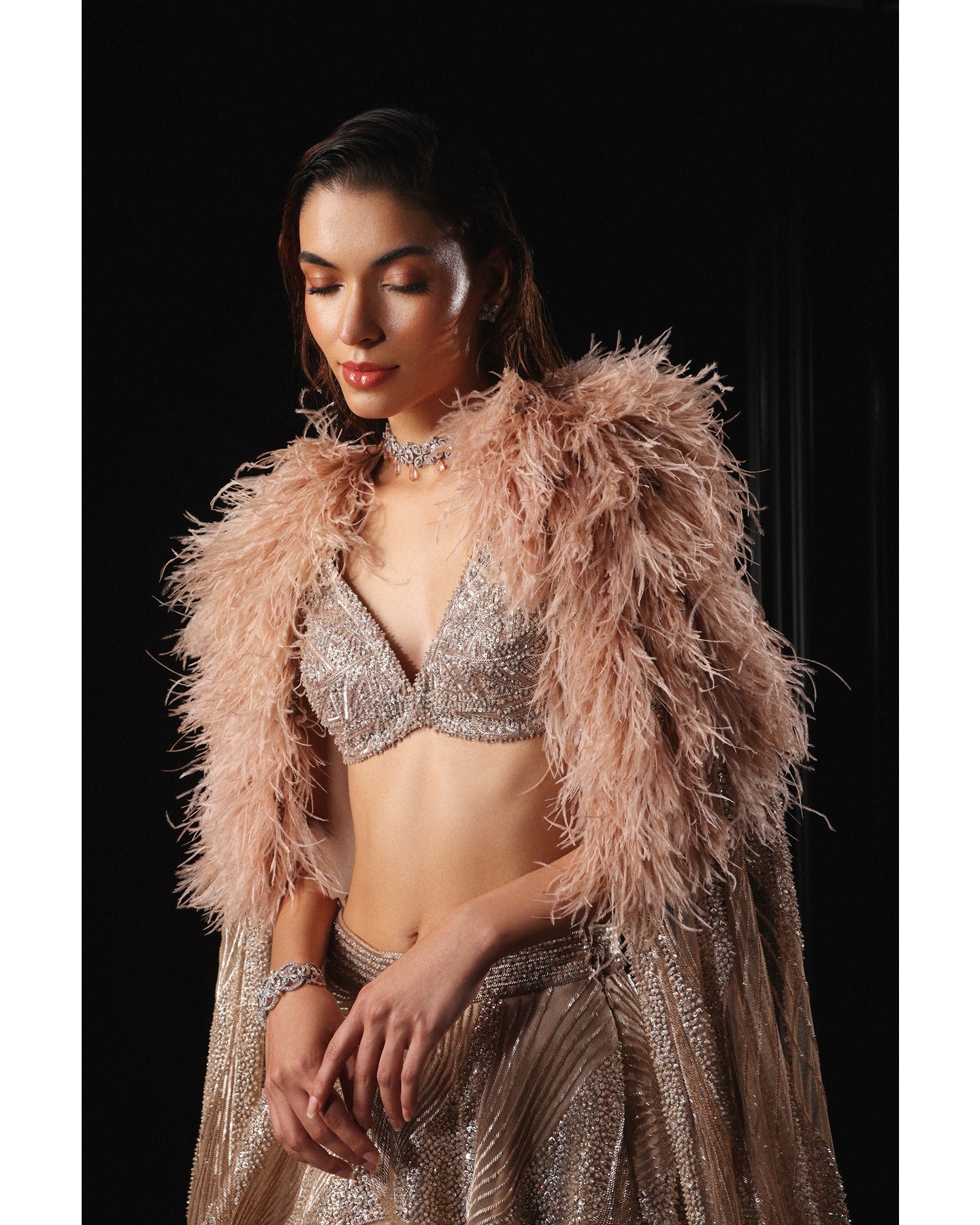 Elegance in every detail—our Light Coffee Brown Lehenga adorned with stones, crystals, sequins, and Japanese cut-dana creates a captivating symphony of sophistication.