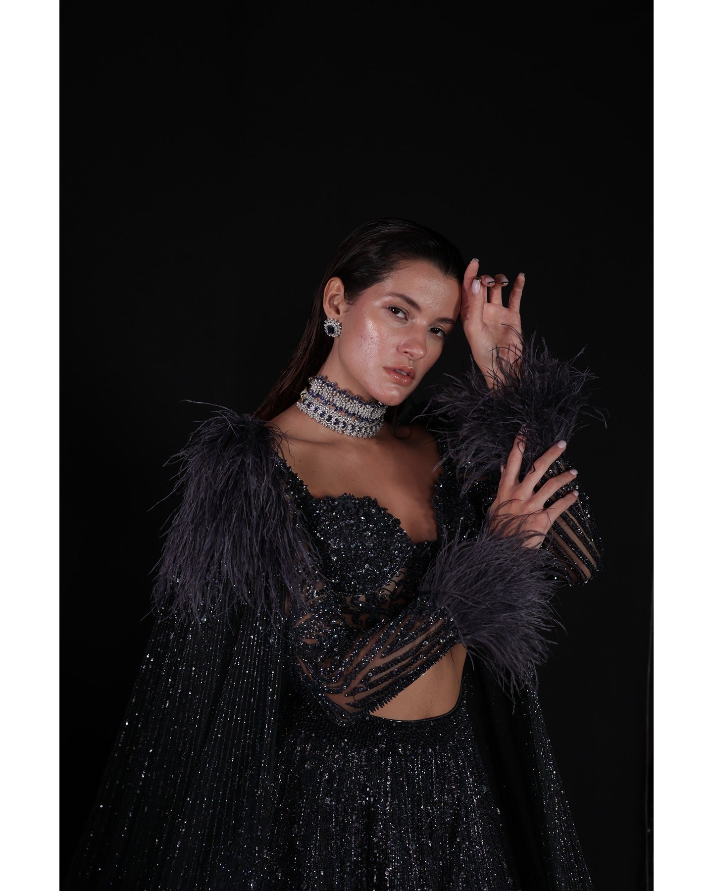 Draped in elegance, the Charcoal Blue Lehenga whispers tales of sophistication and grace.