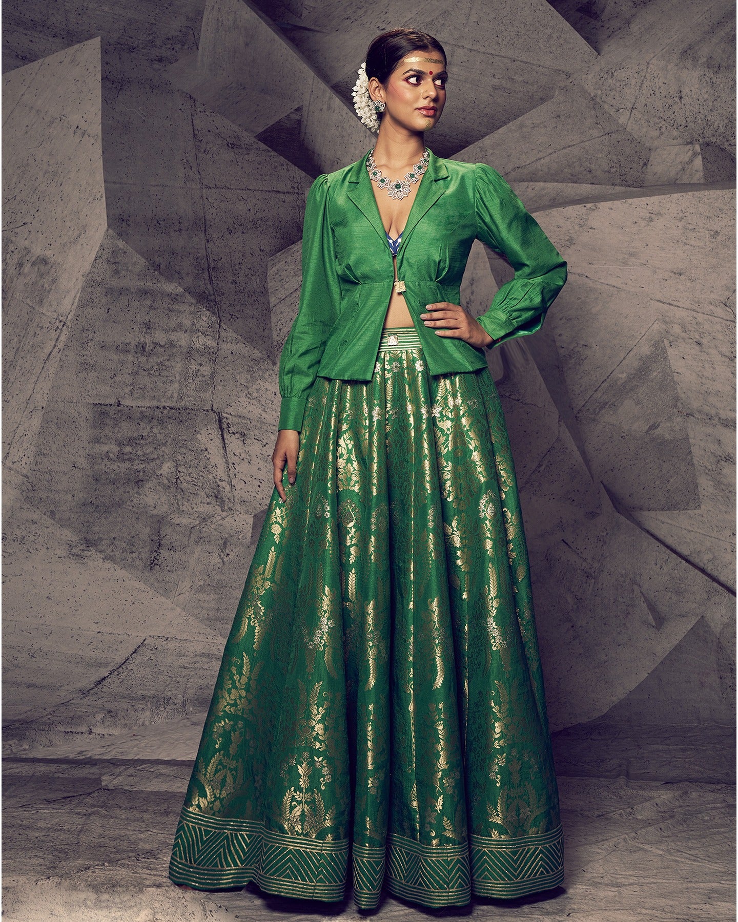 Radiating the freshness of nature, this green lehenga paired with a chic shirt is a modern ode to traditional elegance.