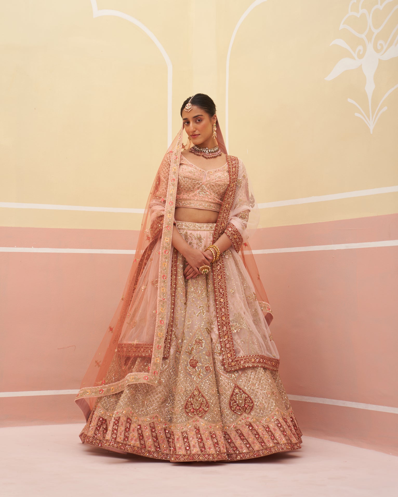 Stunning Peach Lehenga Set with Delicate Embroidery Detailing