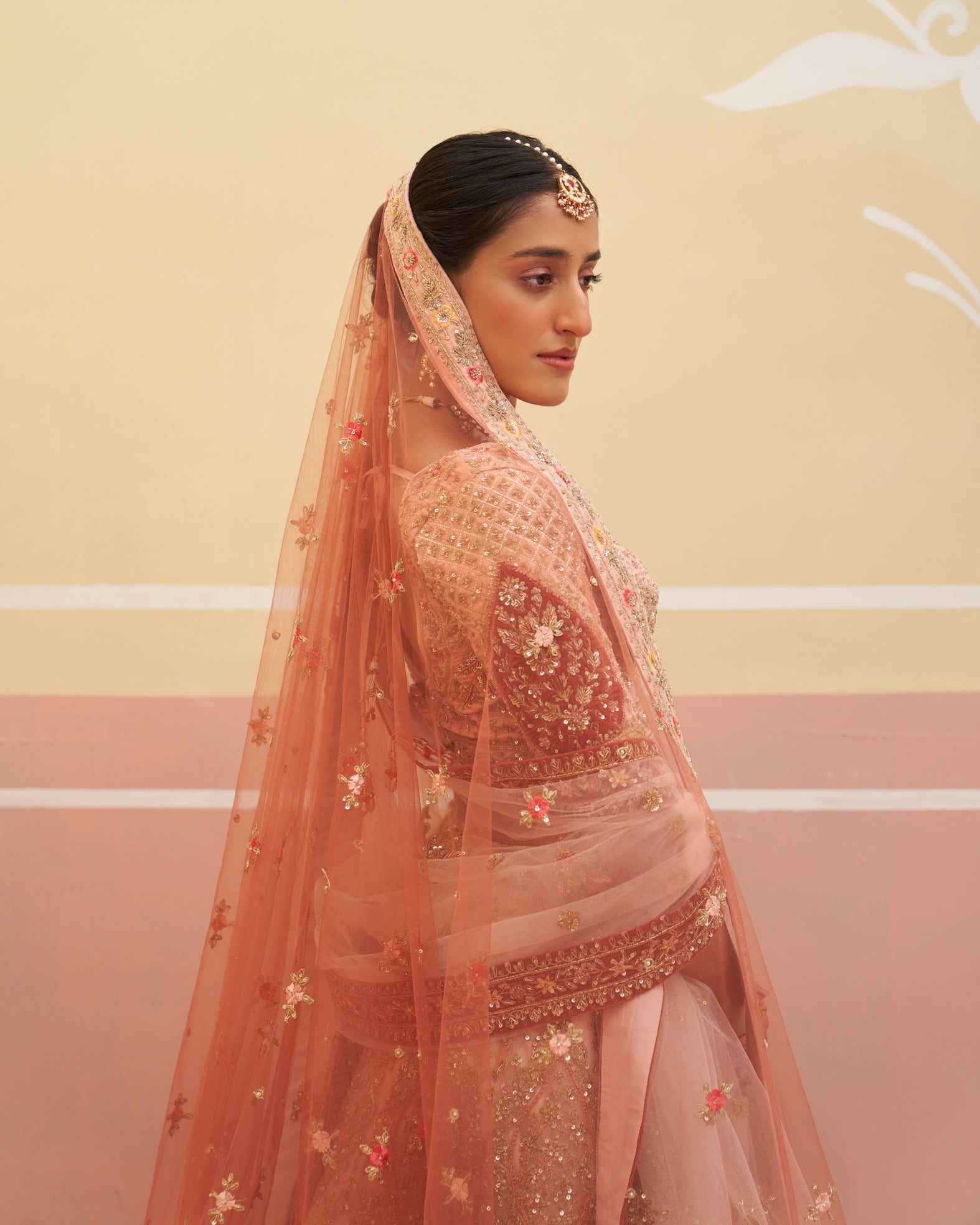 Beautiful Peach Lehenga Set with Flowy Organza Skirt and Matching Blouse