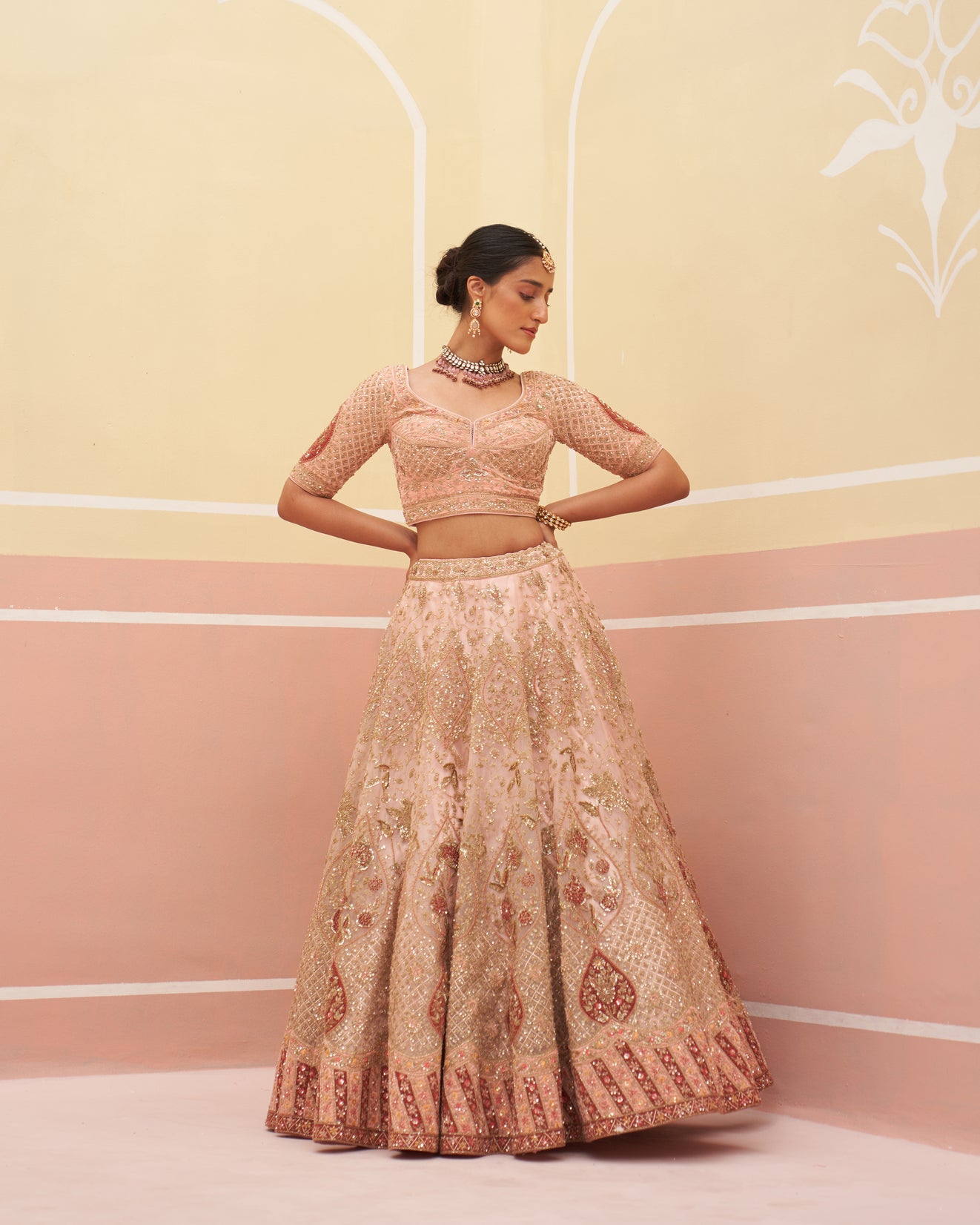 Regal Peach Organza Lehenga Set with Intricate Embellishments
