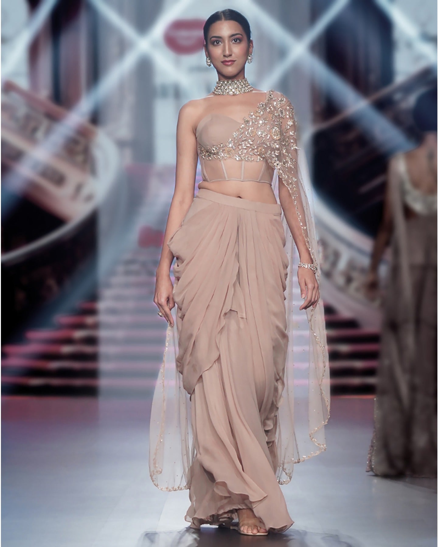 Draped in the timeless elegance of beige, our Spree Corset Dhoti Set weaves a tale of sophistication.