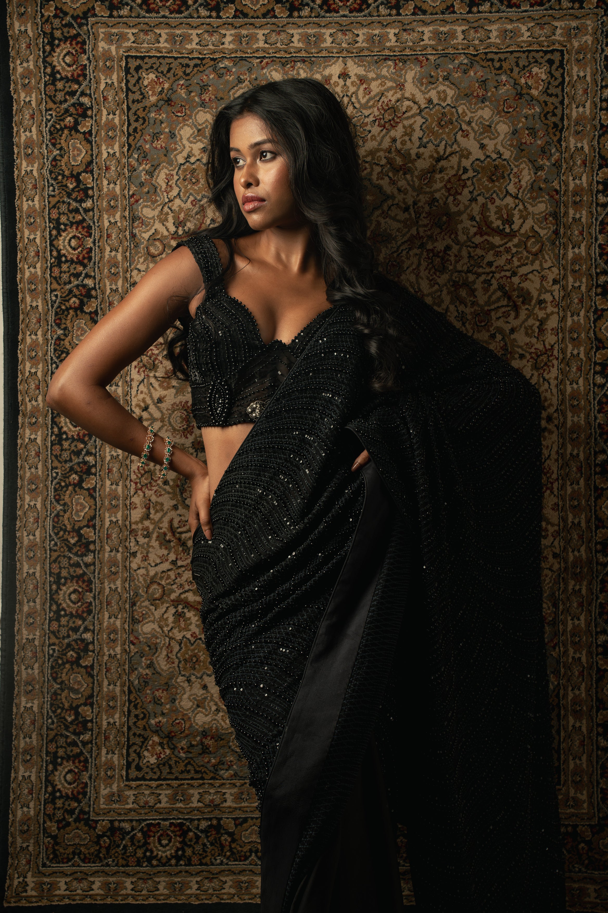 Threaded intricacy meets satin sophistication. This black ensemble is a blend of tradition and contemporary finesse.