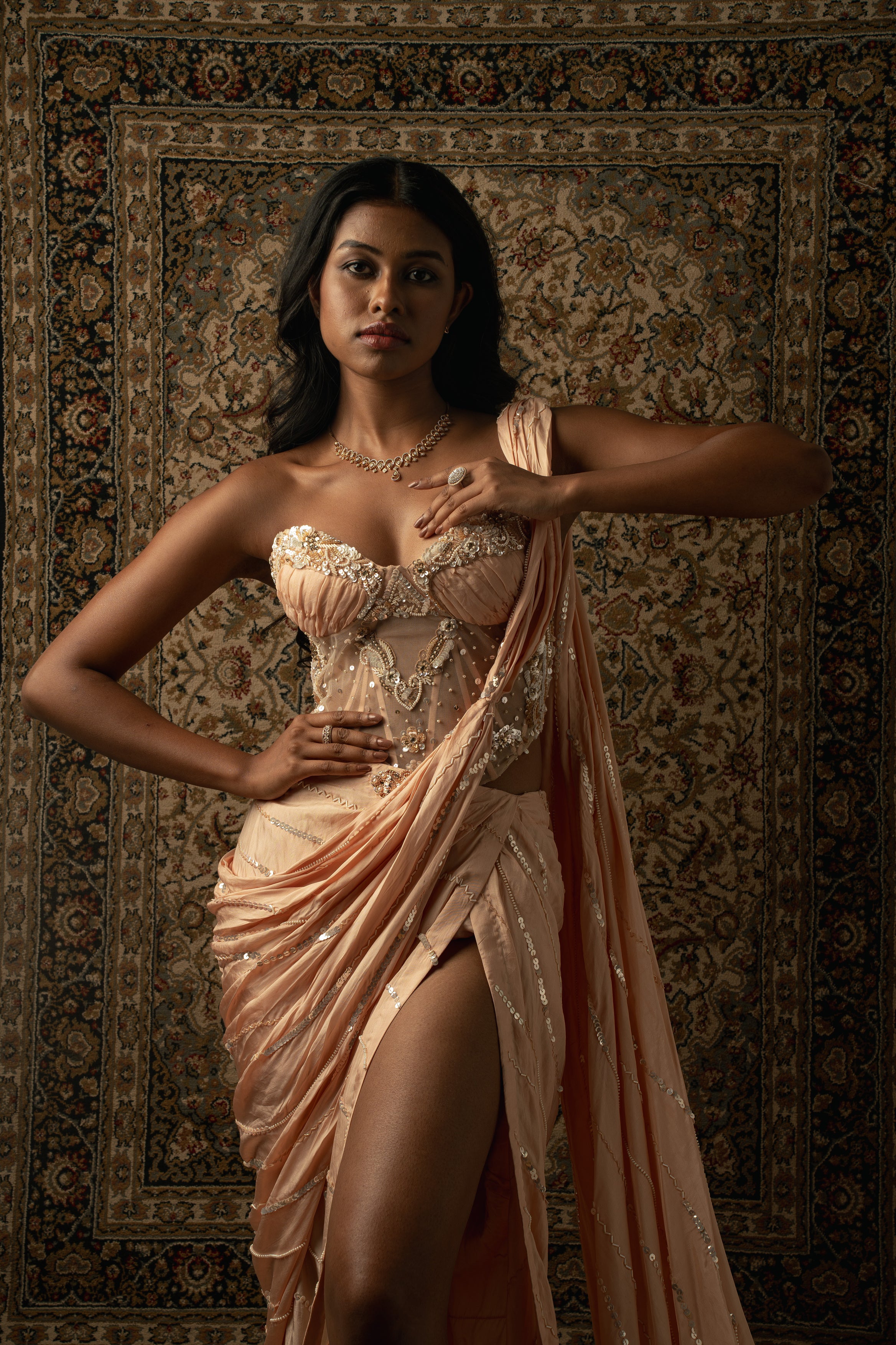 Effortless allure in peach: Satin silk saree paired with a delicate net blouse. Embrace elegance with this pre-draped ensemble.