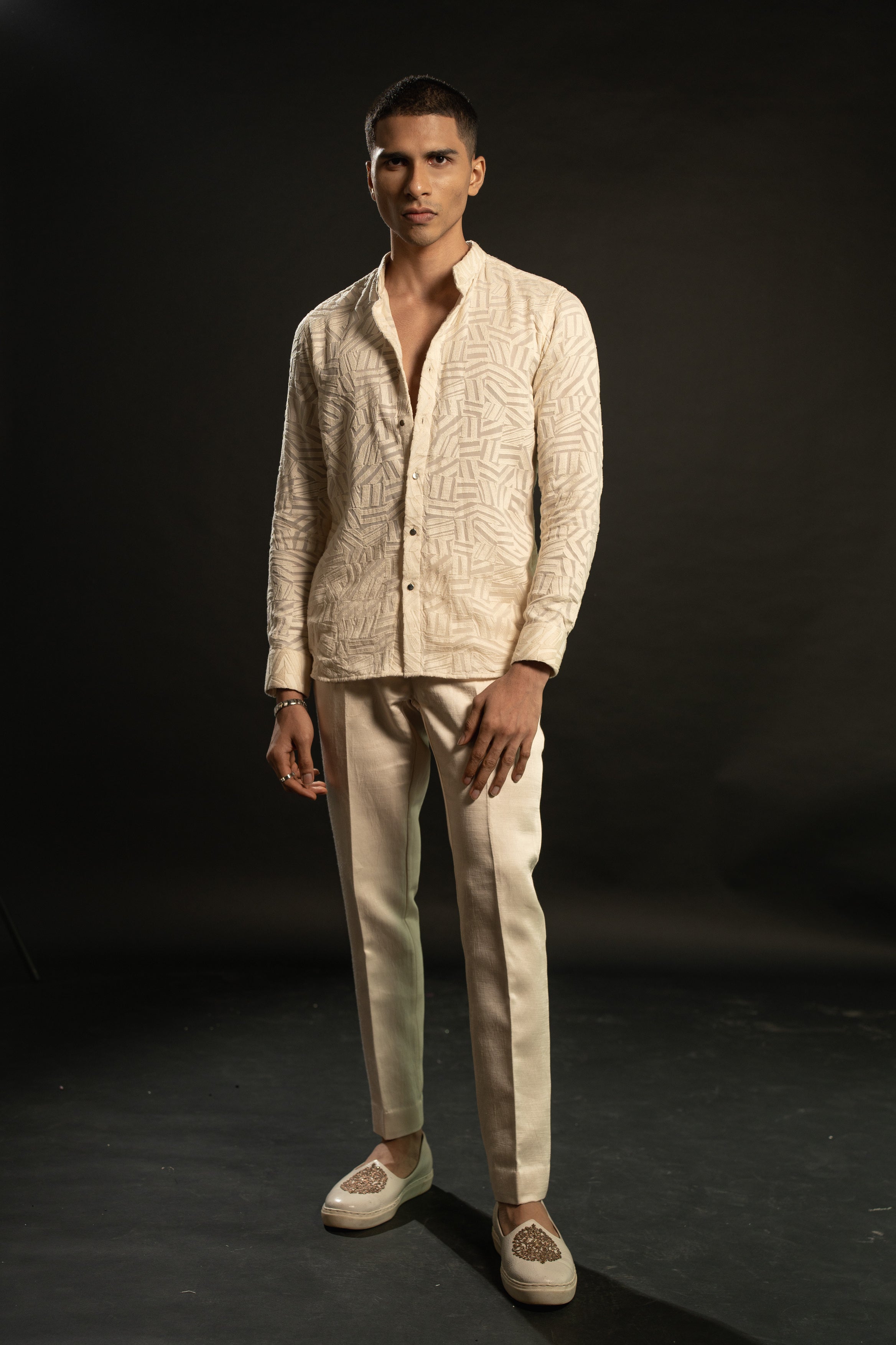 A study in elegance: Ivory georgette shirt with organza lining, paired with linen satin pants. Effortlessly sophisticated.