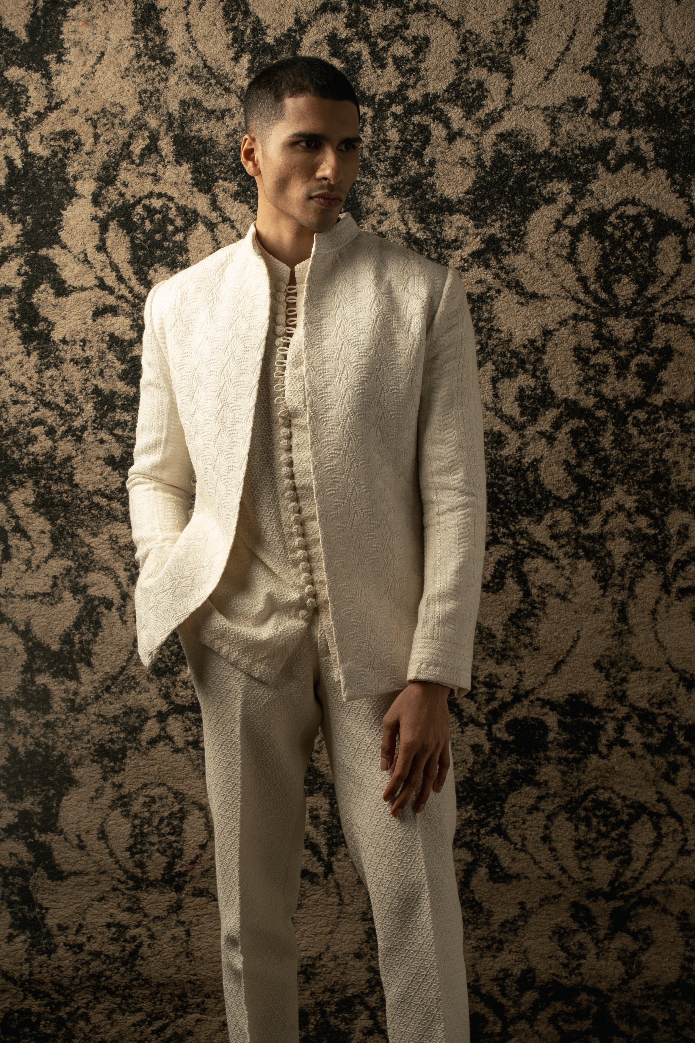 Elevate your elegance with Ivory: Silk Jacket paired with Georgette Shirt and Pants, a sophisticated ensemble exuding timeless charm.