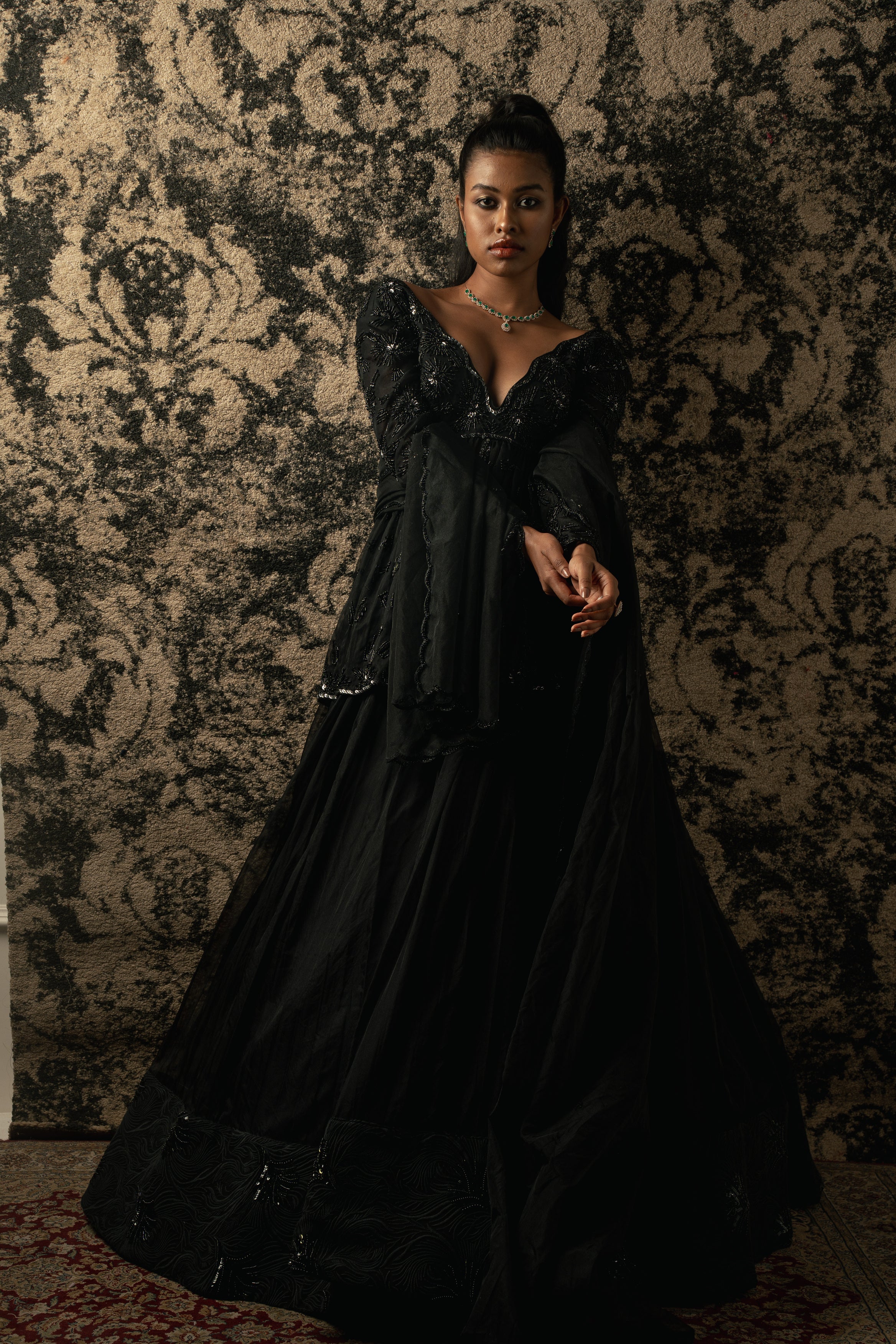 A symphony of black elegance: Organza Lehenga meets its match in a chic Peplum Kurta, exuding sophistication with every step.