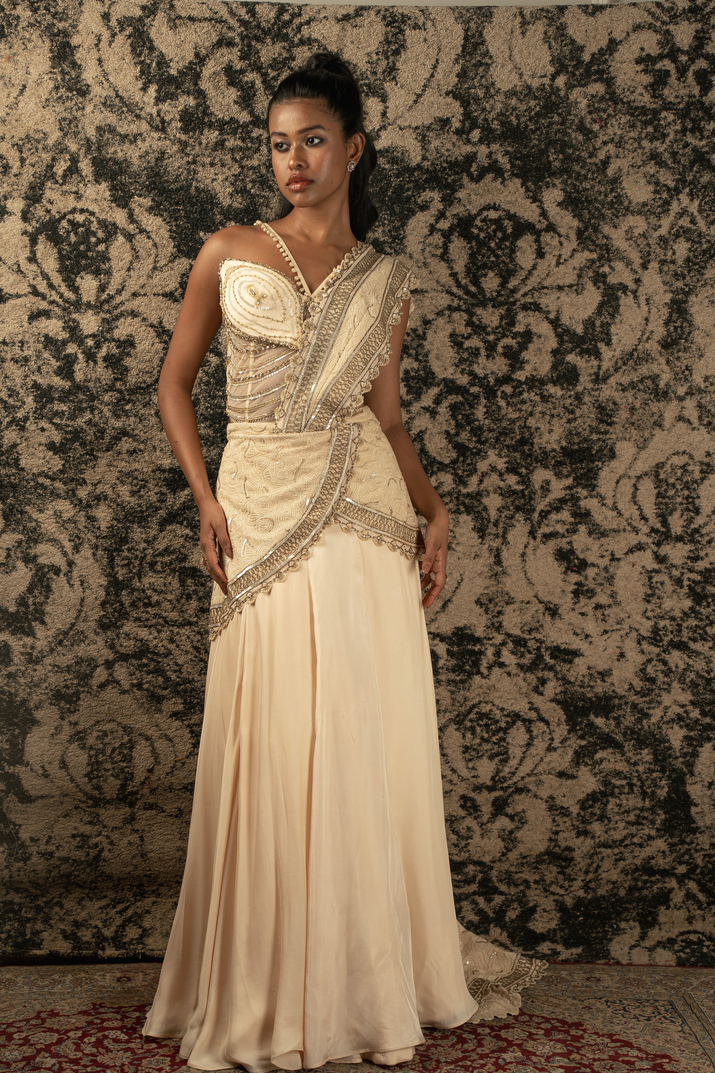 Effortlessly elegant in Light Gold: Pre-draped Saree featuring Silk Satin skirt, Net blouse, and Luckhnawi Silk drape, a fusion of sophistication and grace.