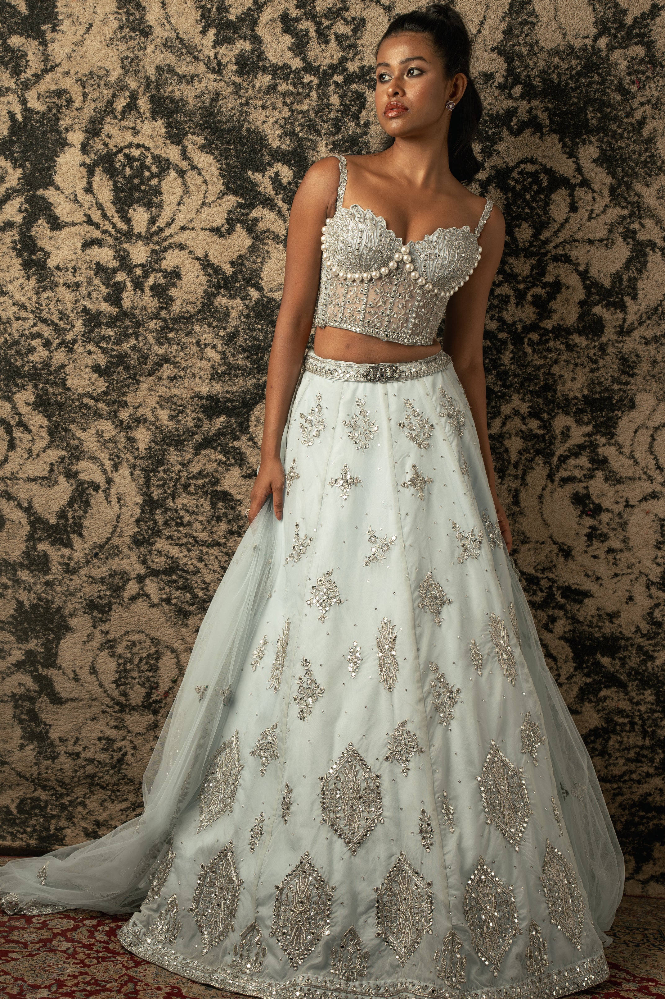Stellar Blue dreams: Embrace the allure of this Organza Lehenga paired with Net blouse and Dupatta, a celestial symphony of elegance.