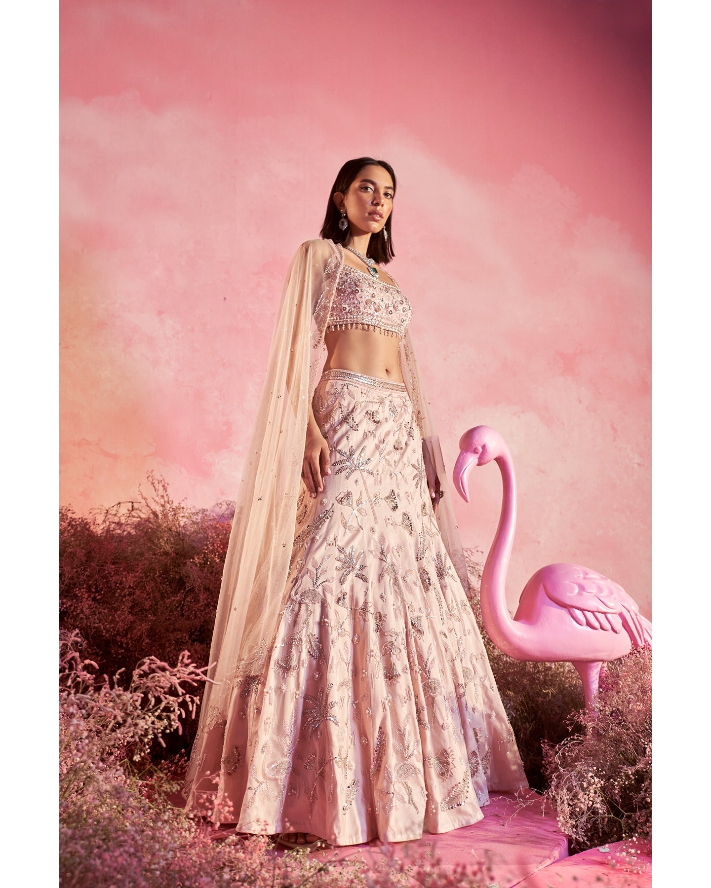 Dreamy in pink: This lehenga is a symphony of elegance, weaving a tale of timeless charm with every twirl.