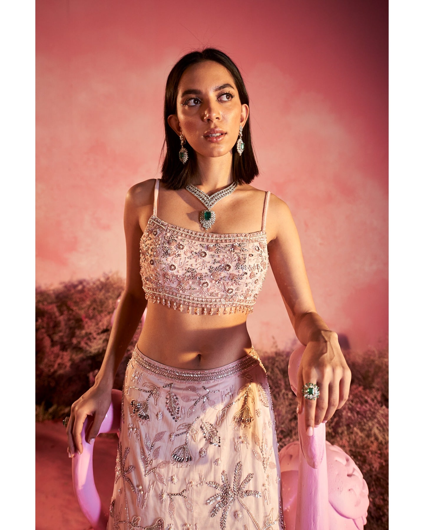 Dreamy in pink: This lehenga is a symphony of elegance, weaving a tale of timeless charm with every twirl. 