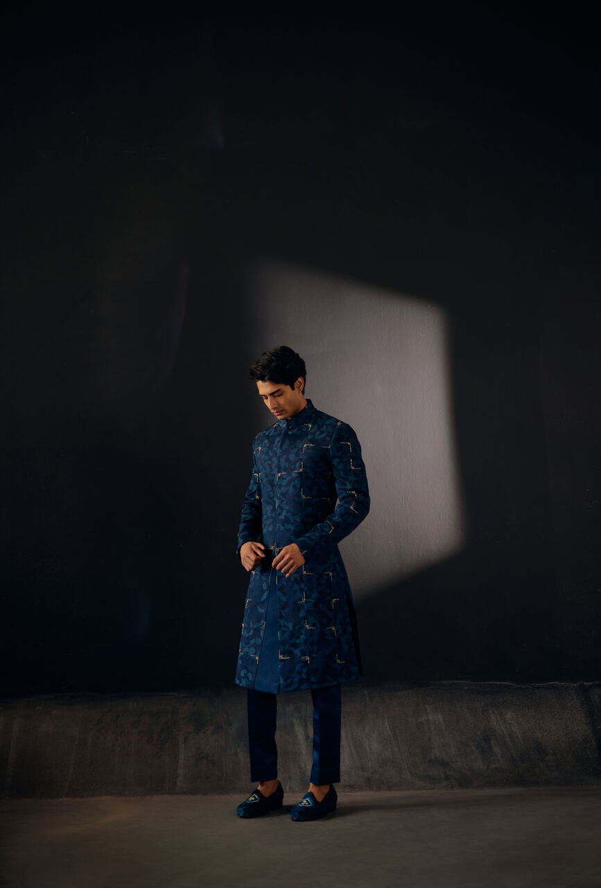Blue Sapphire Sherwani: A regal ensemble exuding timeless elegance