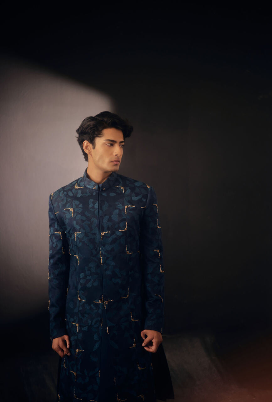 Elegant Blue Sapphire Sherwani: A symbol of grace and distinction.