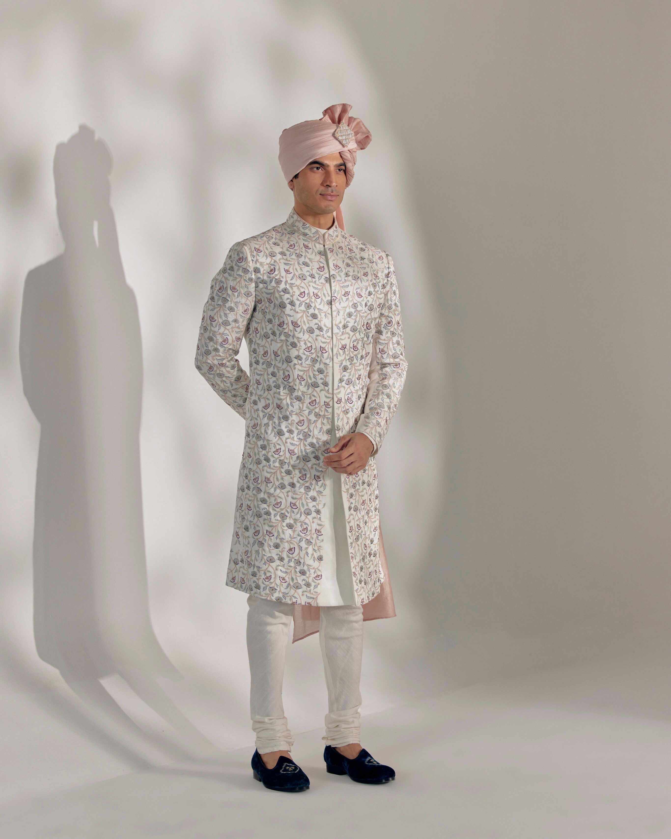 Elegance entwined: The White Vine Sherwani.