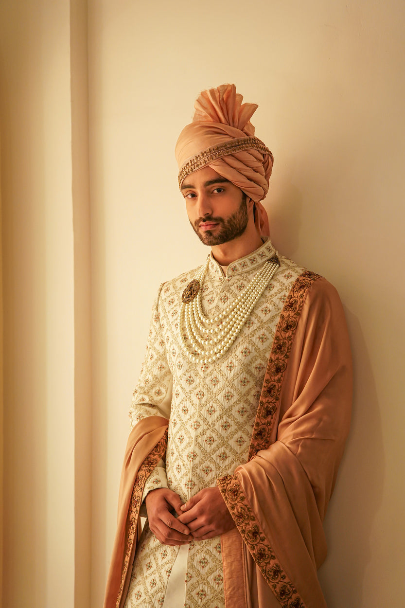 Classic Ivory Tan Sherwani Set: A blend of tradition and modern flair.