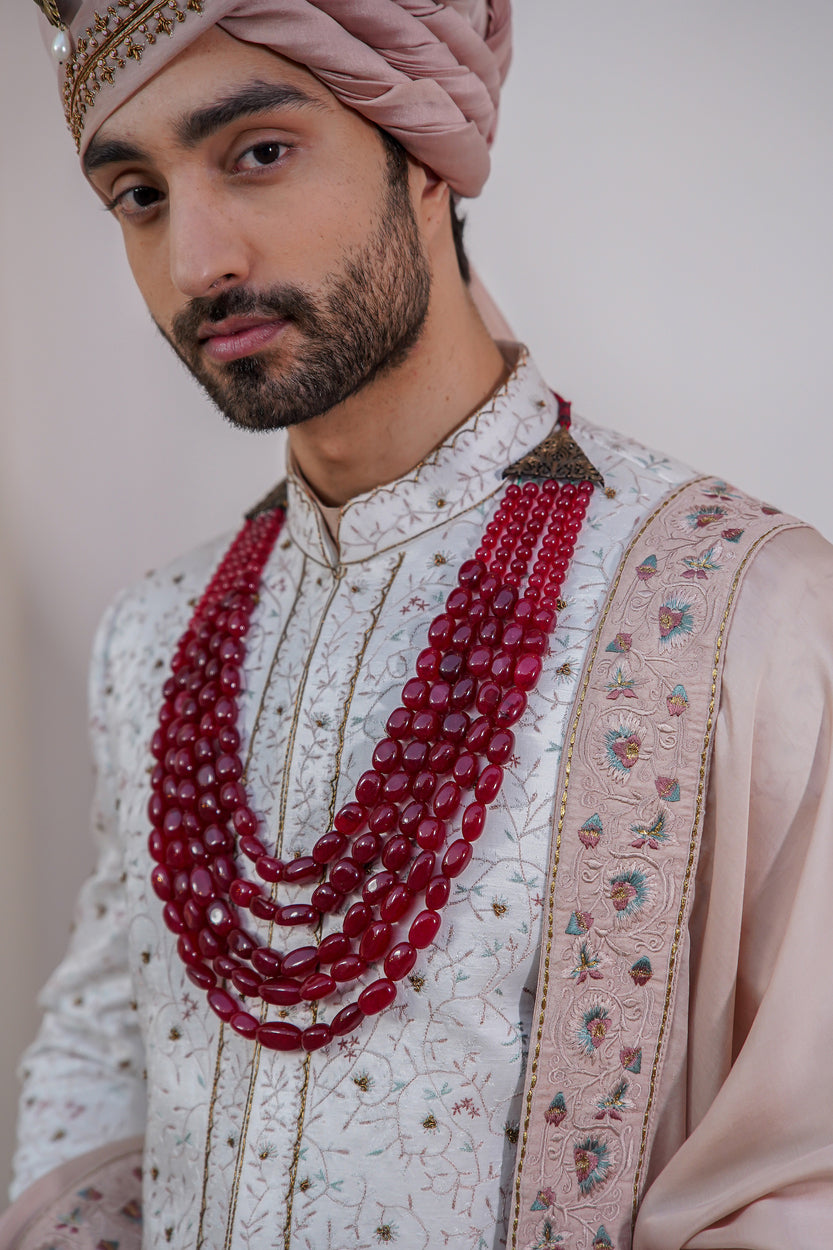 Regal Ivory Chasm Sherwani: Exuding sophistication and grace.