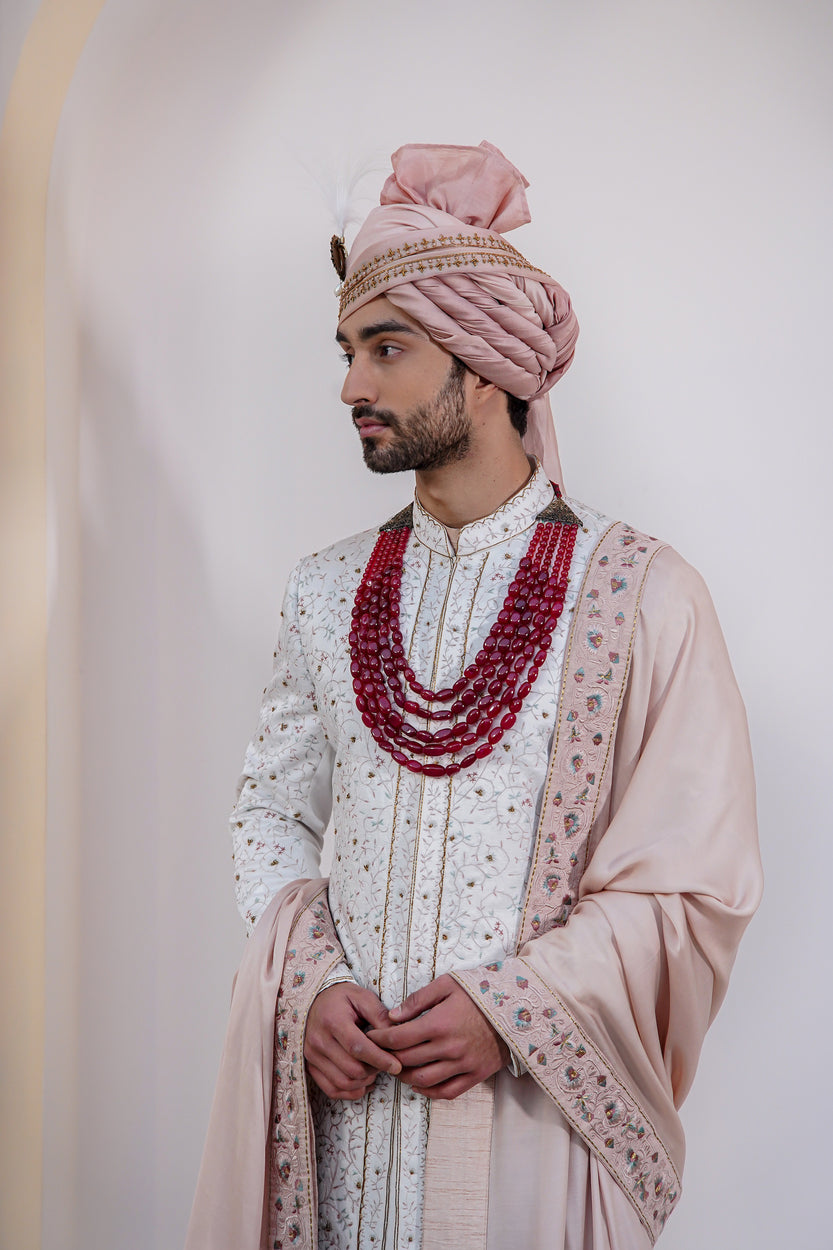 Classic Ivory Chasm Sherwani: A symbol of timeless charm and elegance.