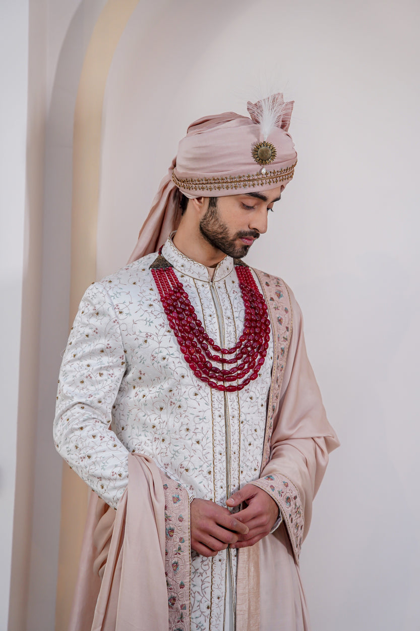 Stylish Ivory Chasm Sherwani: Making a statement with understated elegance.