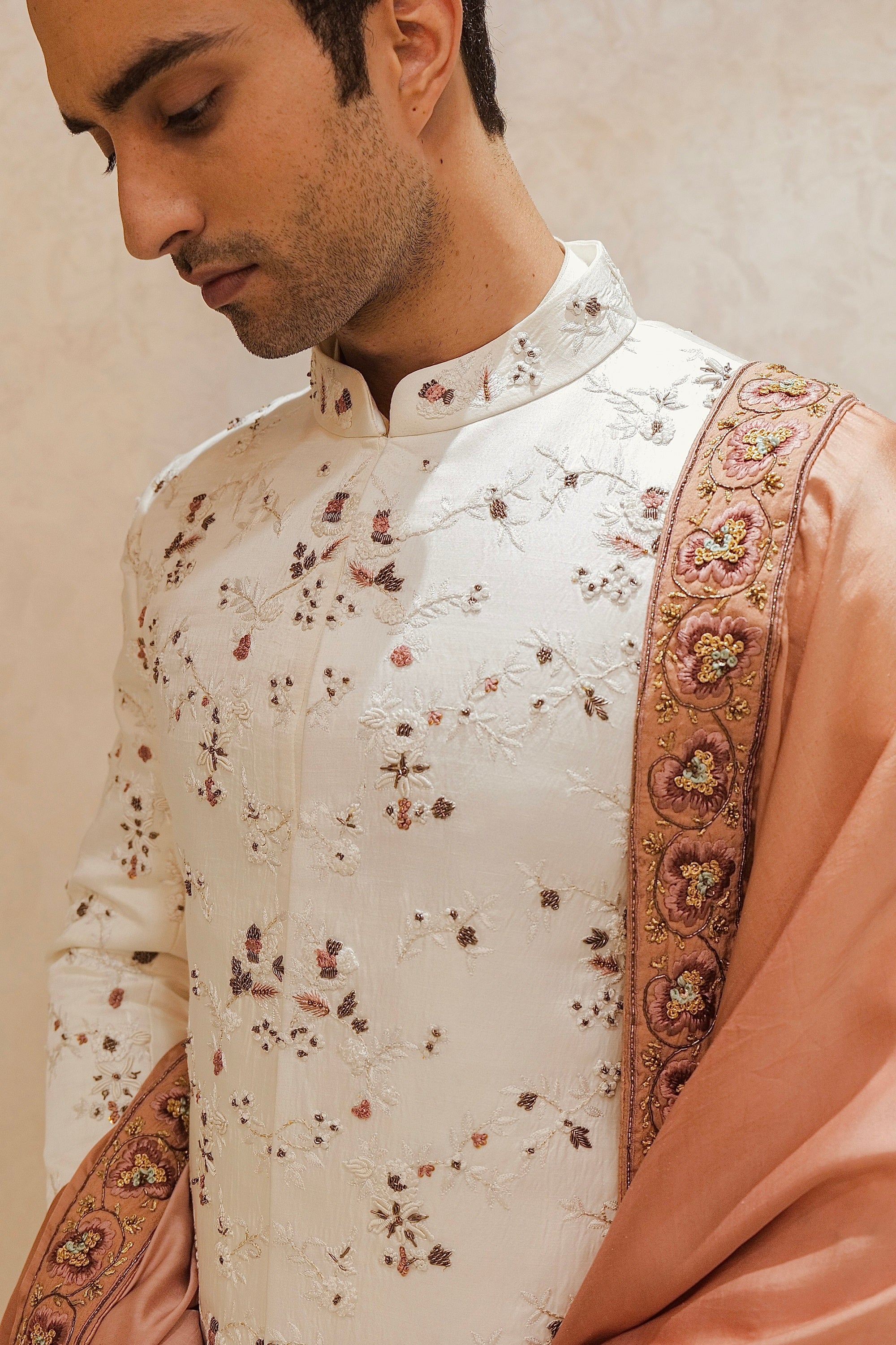 The Regal White Sherwani Set: Exuding opulence and sophistication in every detail.