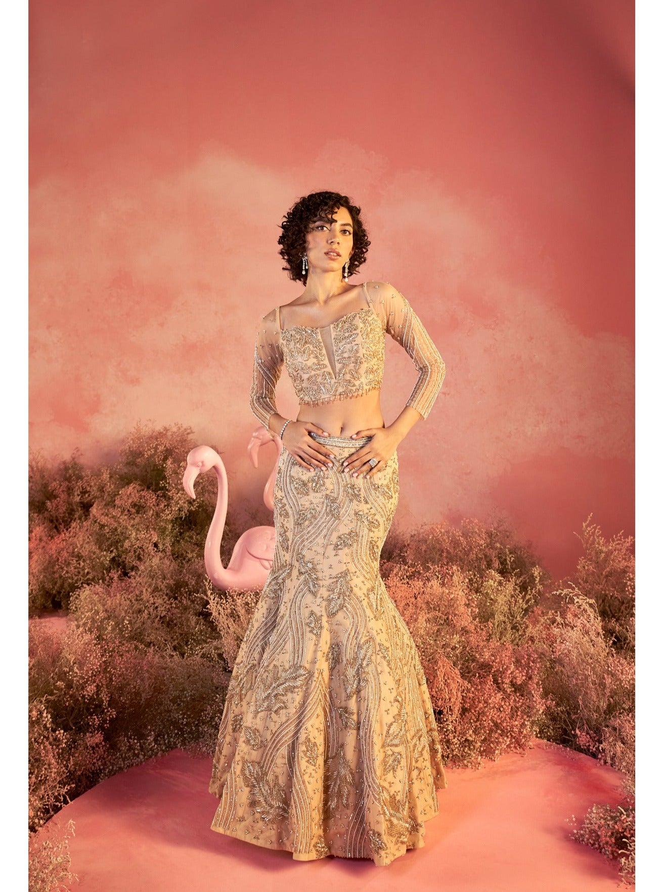 Barely blushing in nude pink: A mesmerizing lehenga that whispers elegance and timeless grace.