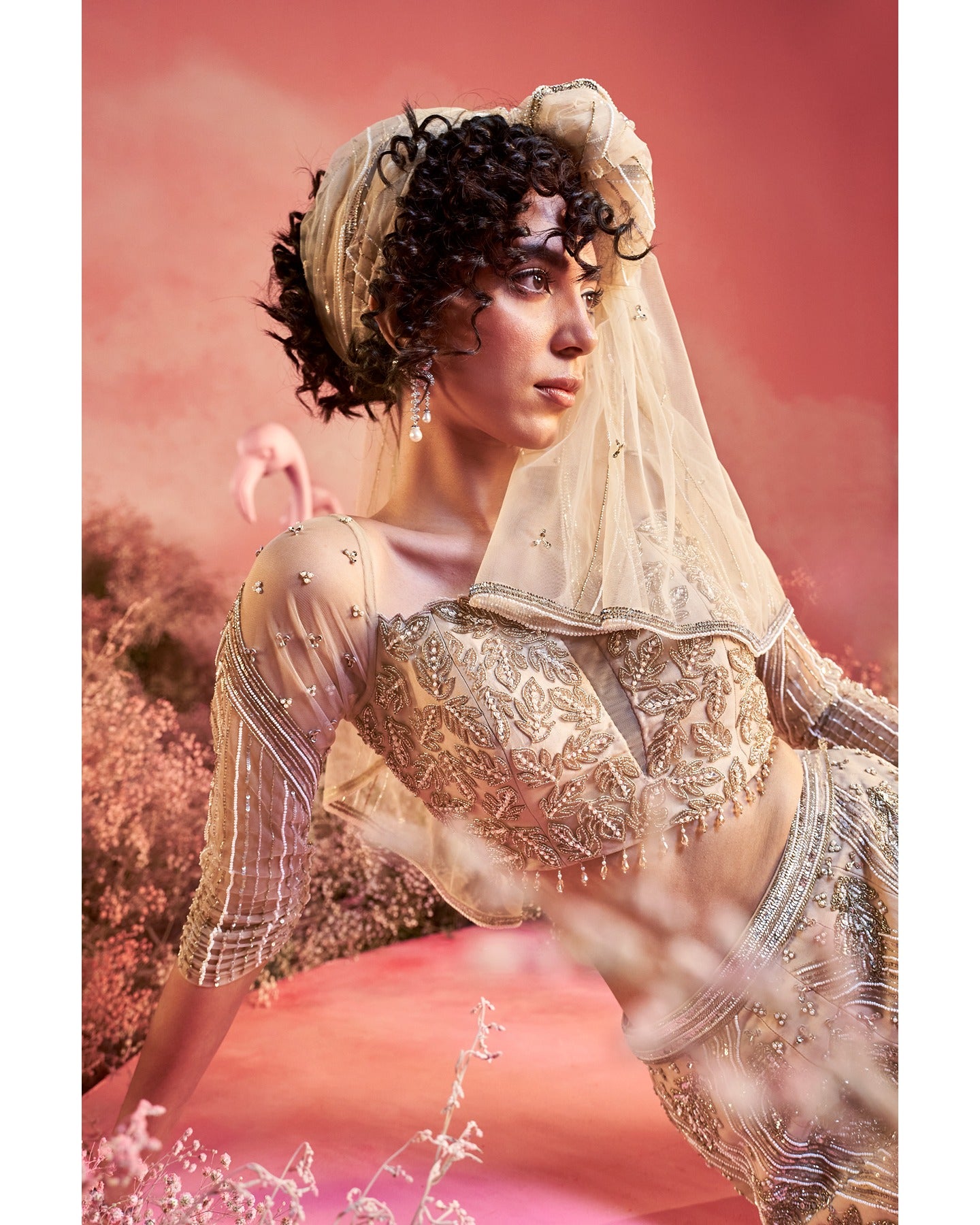 Barely blushing in nude pink: A mesmerizing lehenga that whispers elegance and timeless grace.