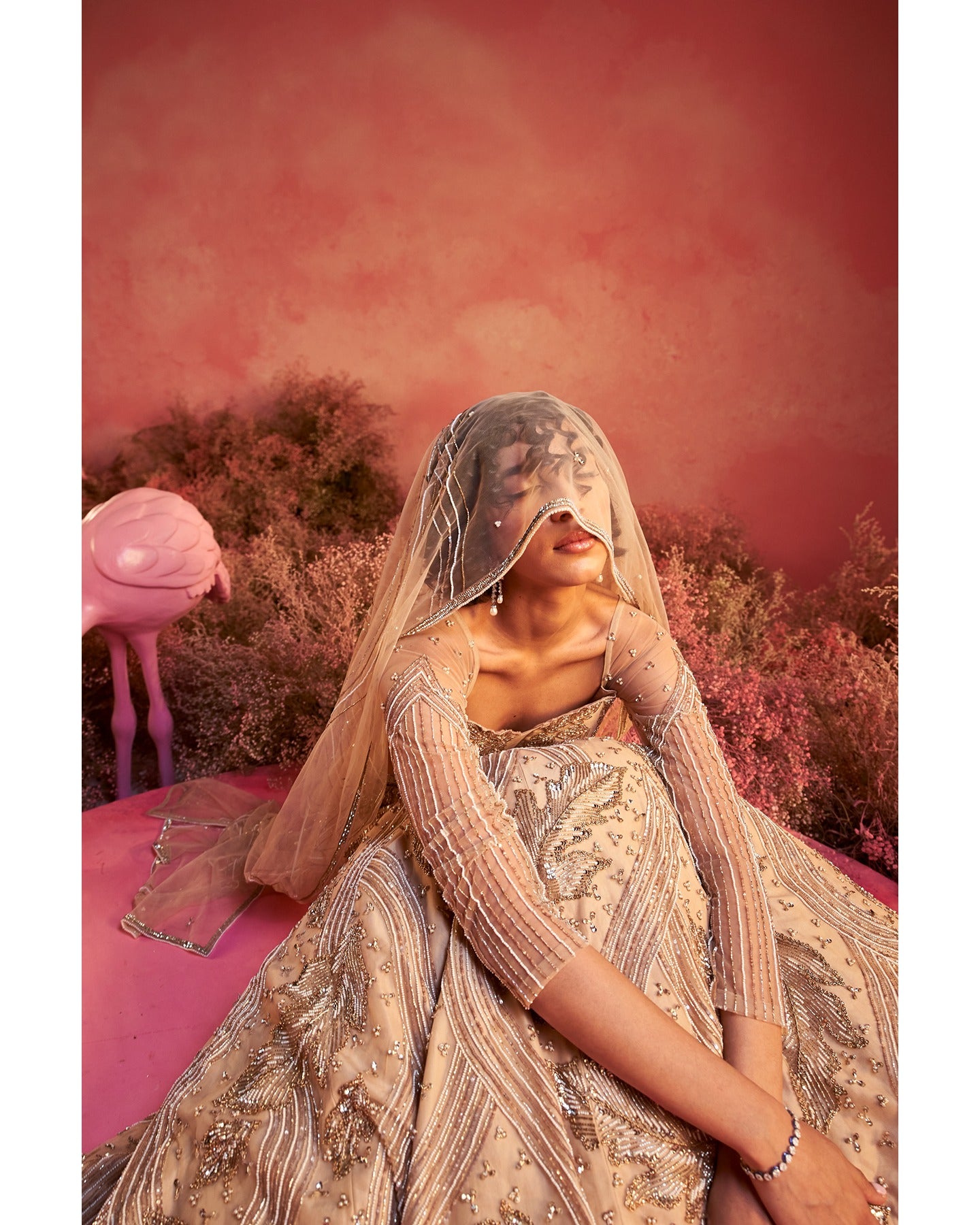 Barely blushing in nude pink: A mesmerizing lehenga that whispers elegance and timeless grace.