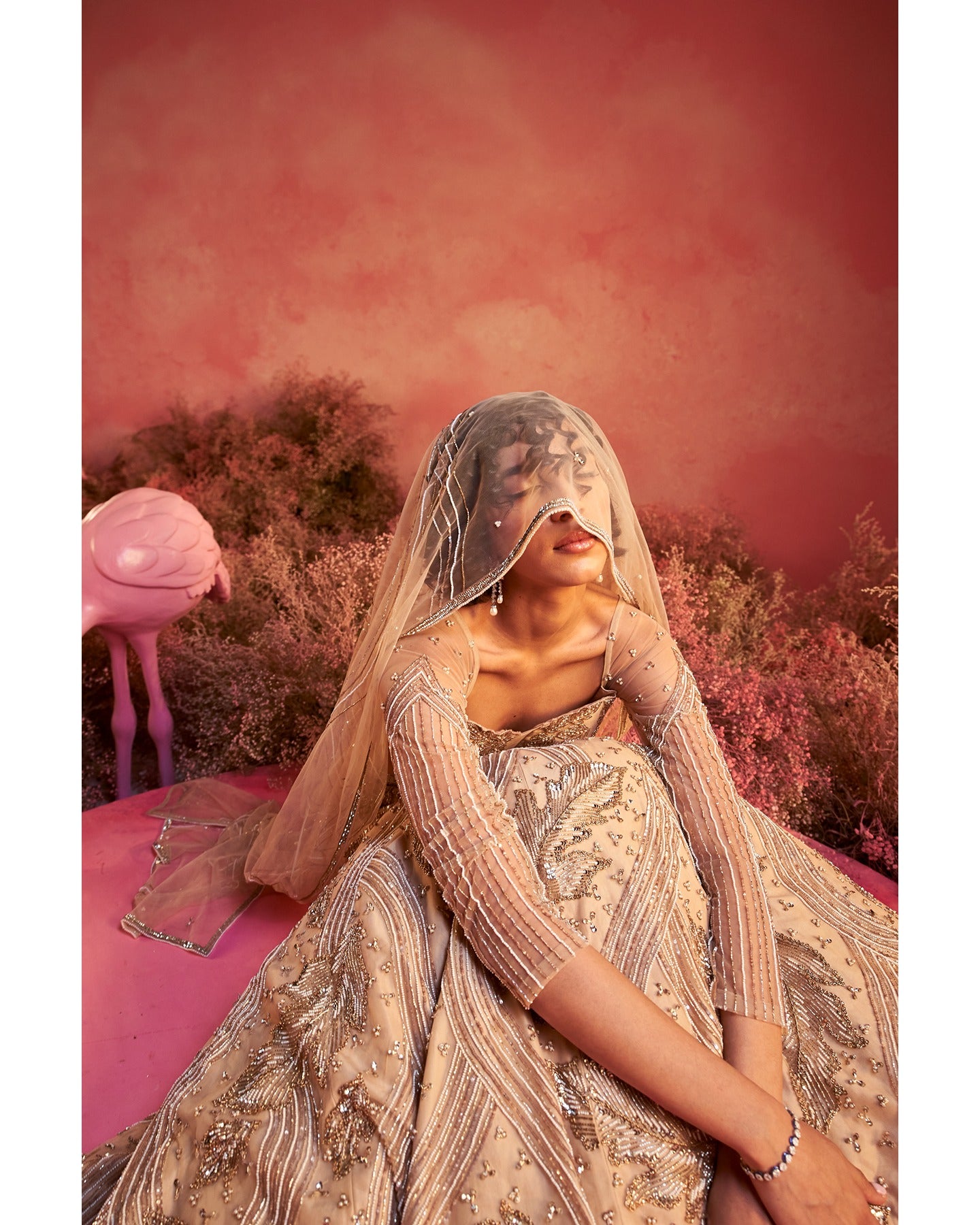 Barely blushing in nude pink: A mesmerizing lehenga that whispers elegance and timeless grace. 