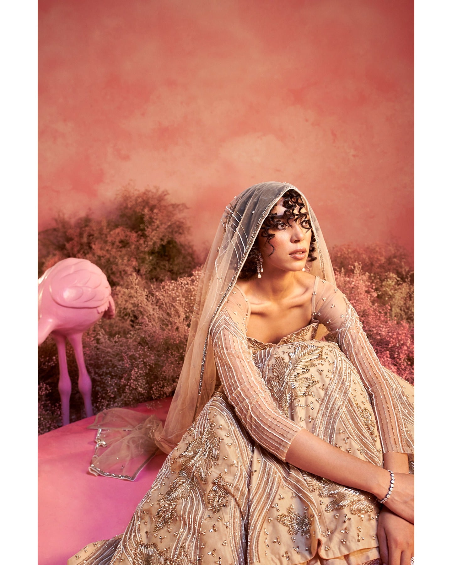 Barely blushing in nude pink: A mesmerizing lehenga that whispers elegance and timeless grace.