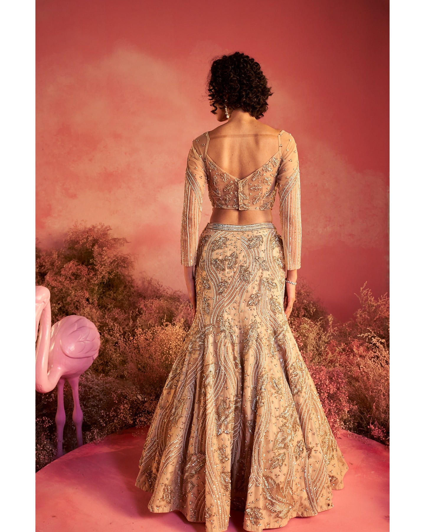 Barely blushing in nude pink: A mesmerizing lehenga that whispers elegance and timeless grace.