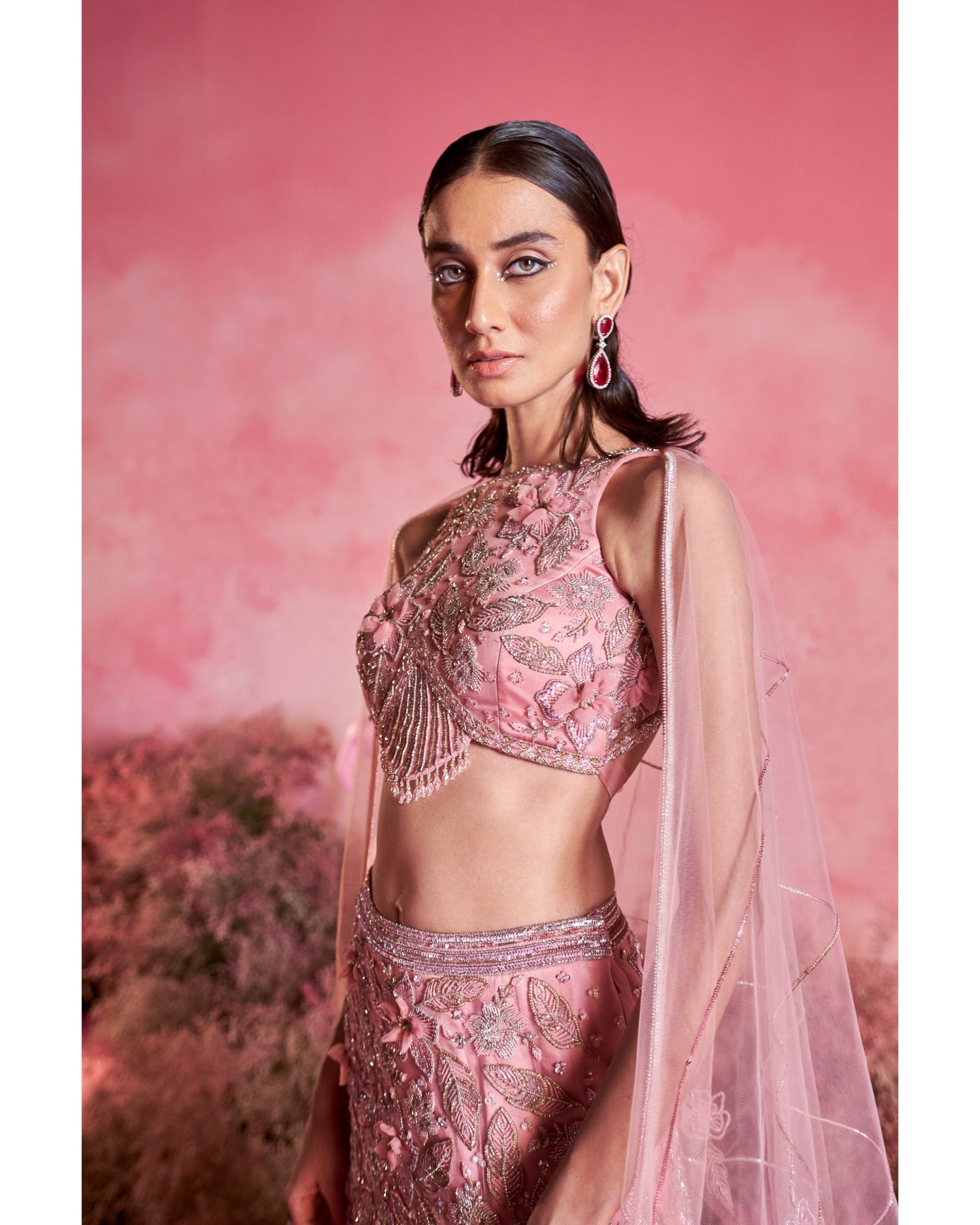 Pink perfection: Unveiling the allure of this stunning lehenga, where elegance meets vibrancy in every twirl.