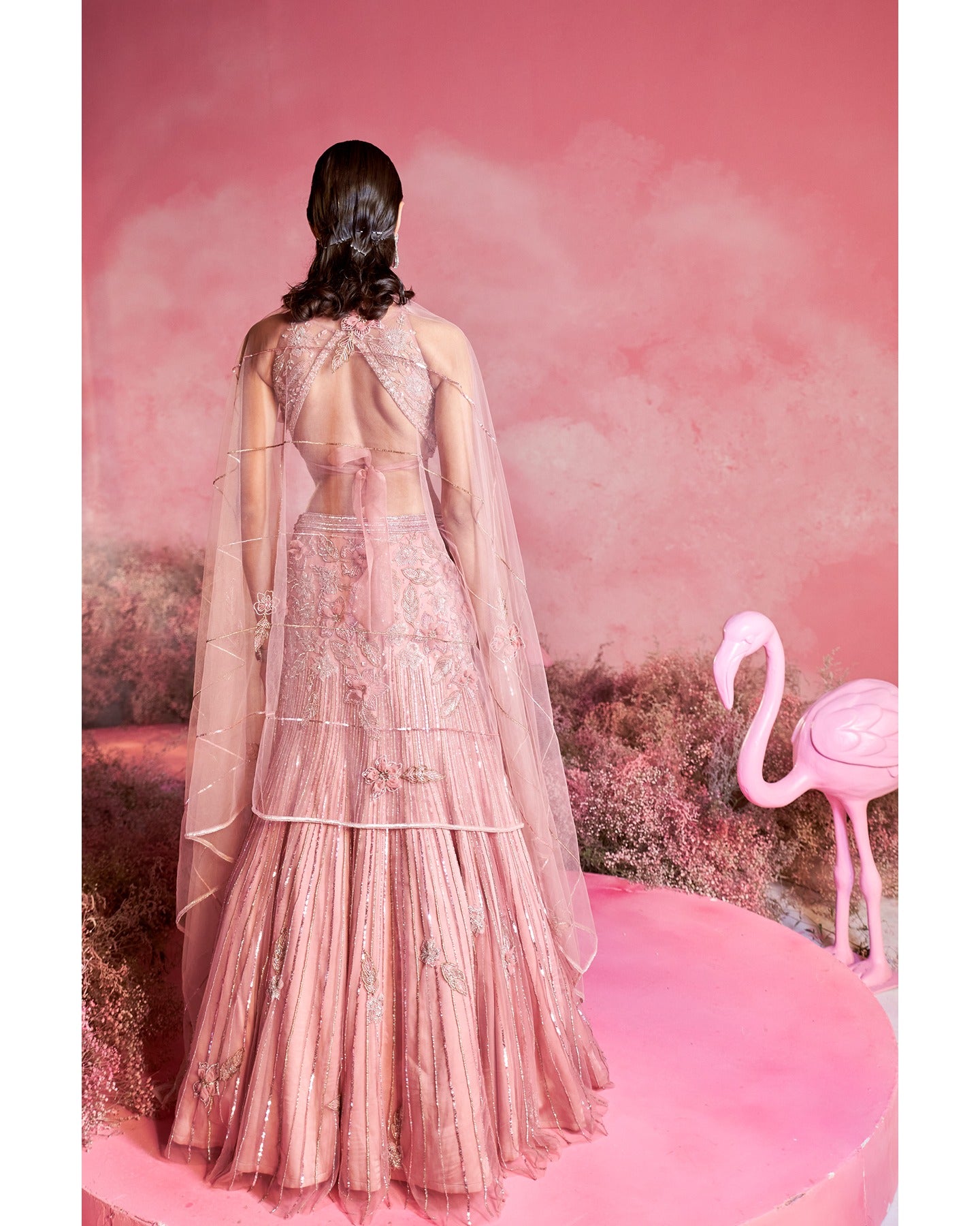 Pink perfection: Unveiling the allure of this stunning lehenga, where elegance meets vibrancy in every twirl.