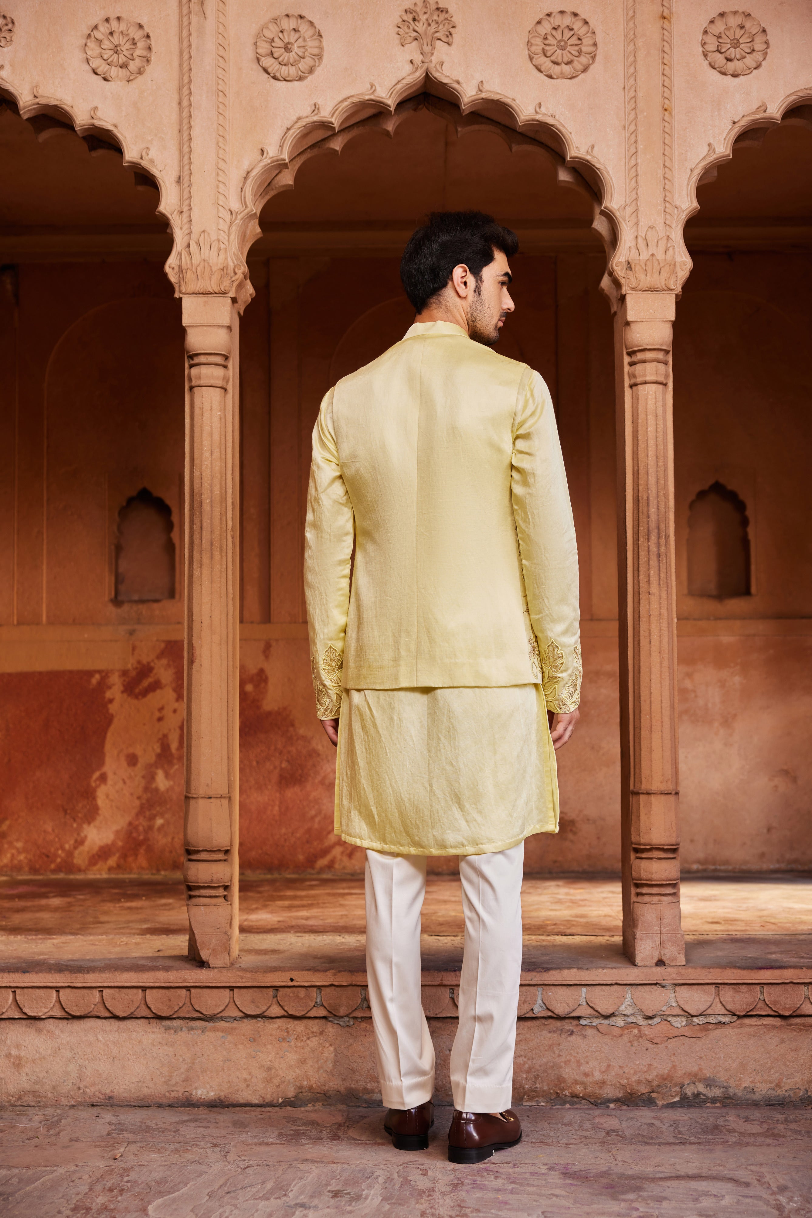 A beautifully crafted Nehru jacket featuring tonal resham, zardozi, and delicate glass beads