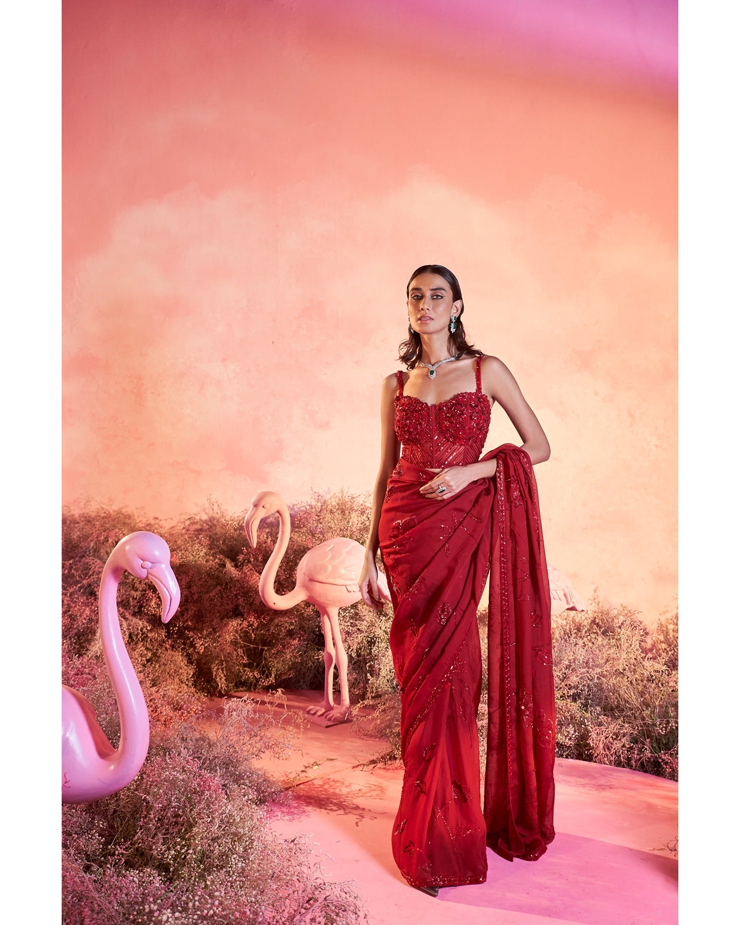 Crimson Chic: A vision in red, where hand-embroidery weaves a story of timeless elegance.