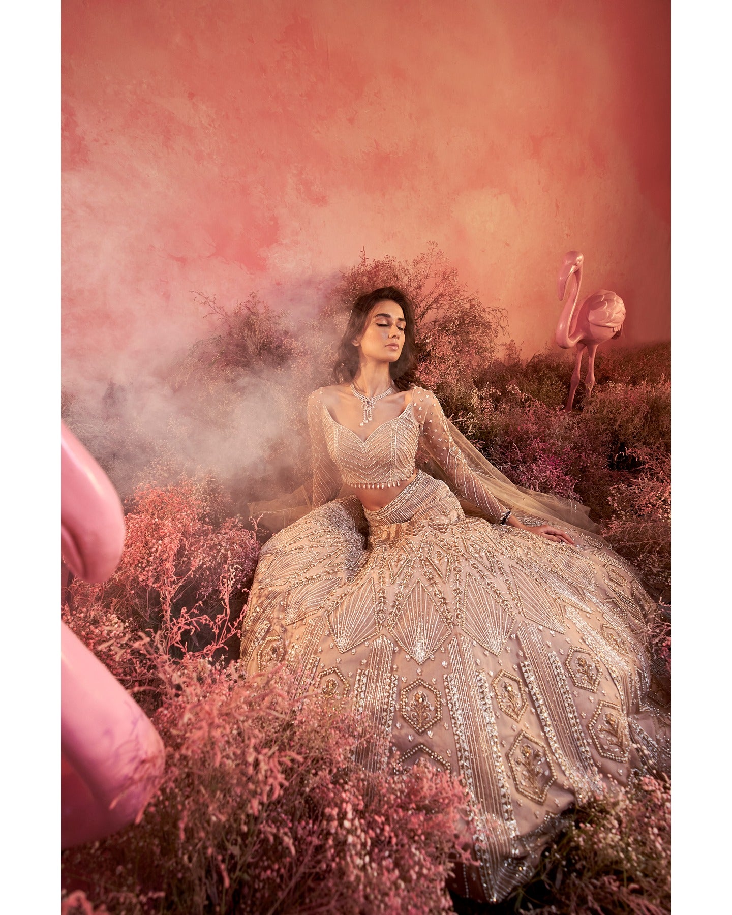 Whispers of artistry in nude tones: A hand-embroidered lehenga that radiates elegance and grace.