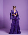 "Draped in regal purple, this pant and suit ensemble with a chic jacket is a royal symphony of style and grace. 