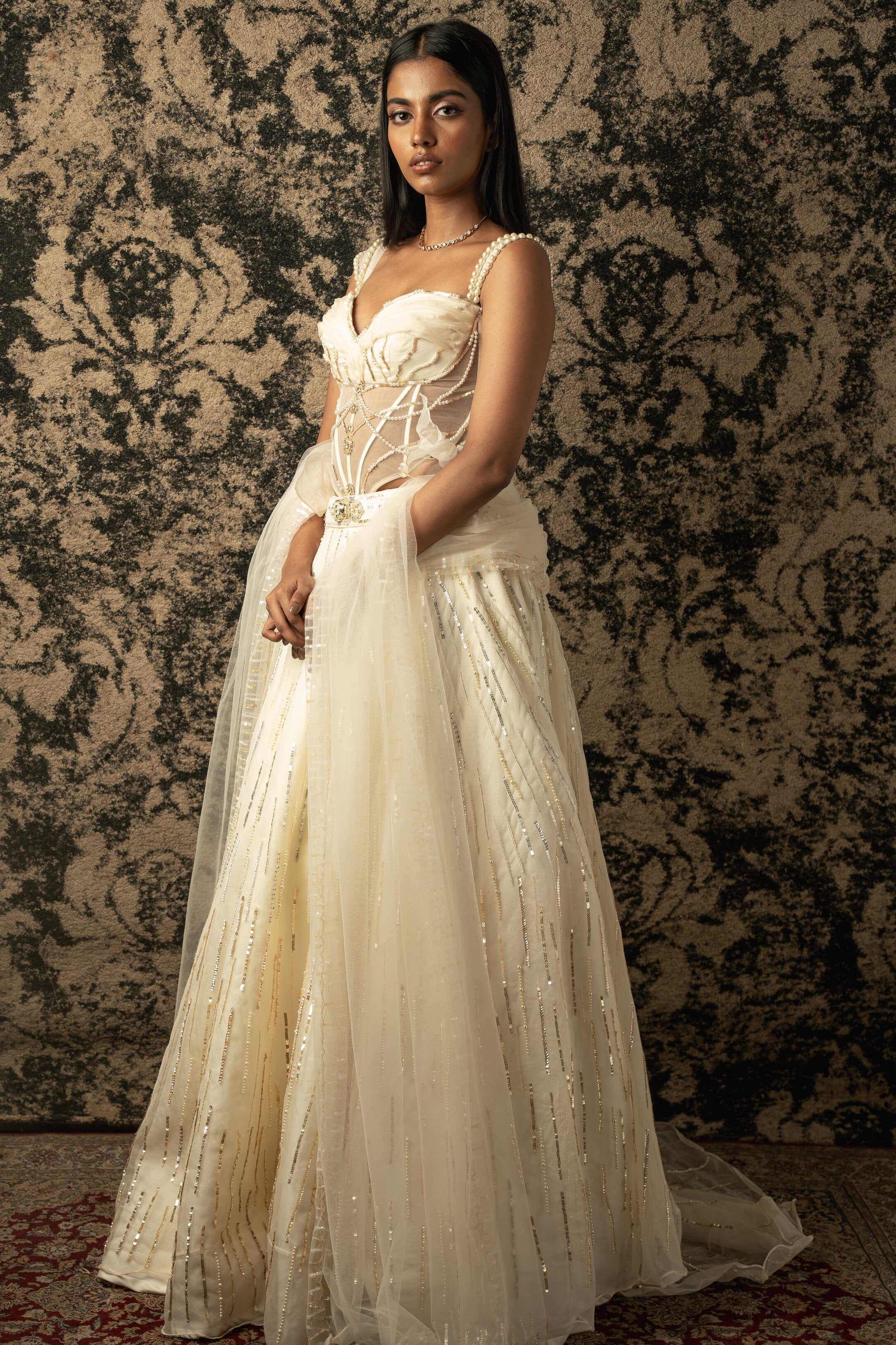 Graceful layers of Silk Organza and Habutai silk unite in this Ivory ensemble, accentuating every movement with elegance.