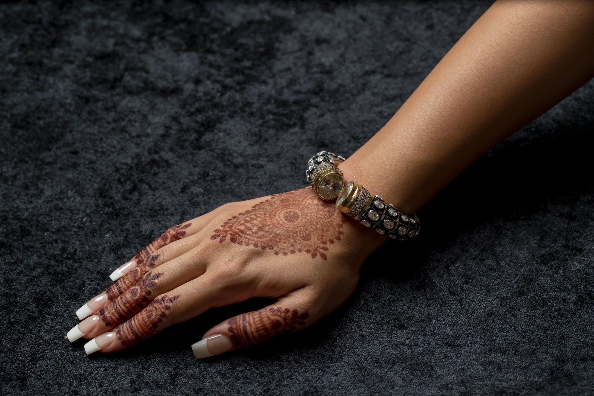 Cuff bracelet with stone ends