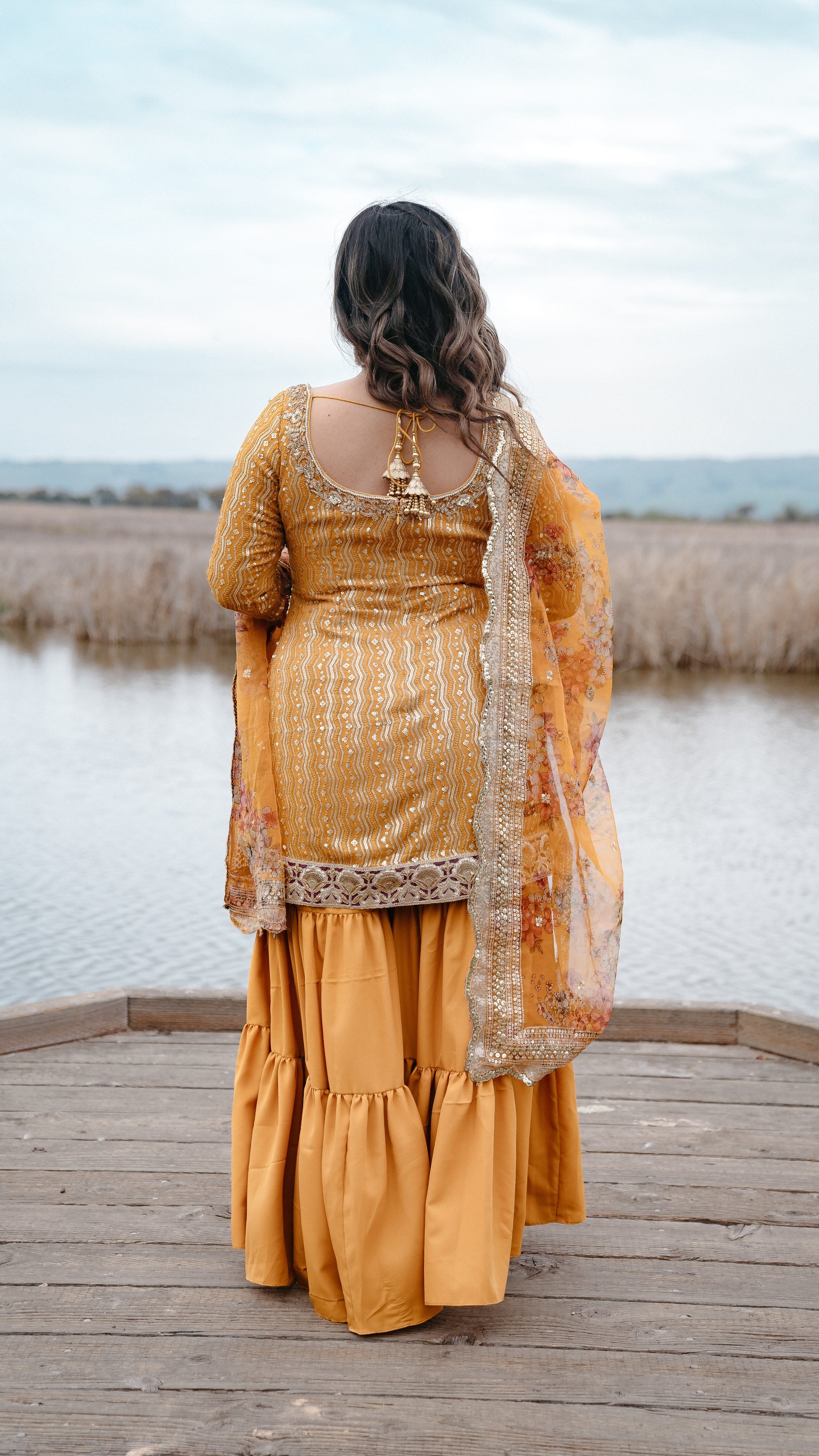 Party wear yellow sharara suit