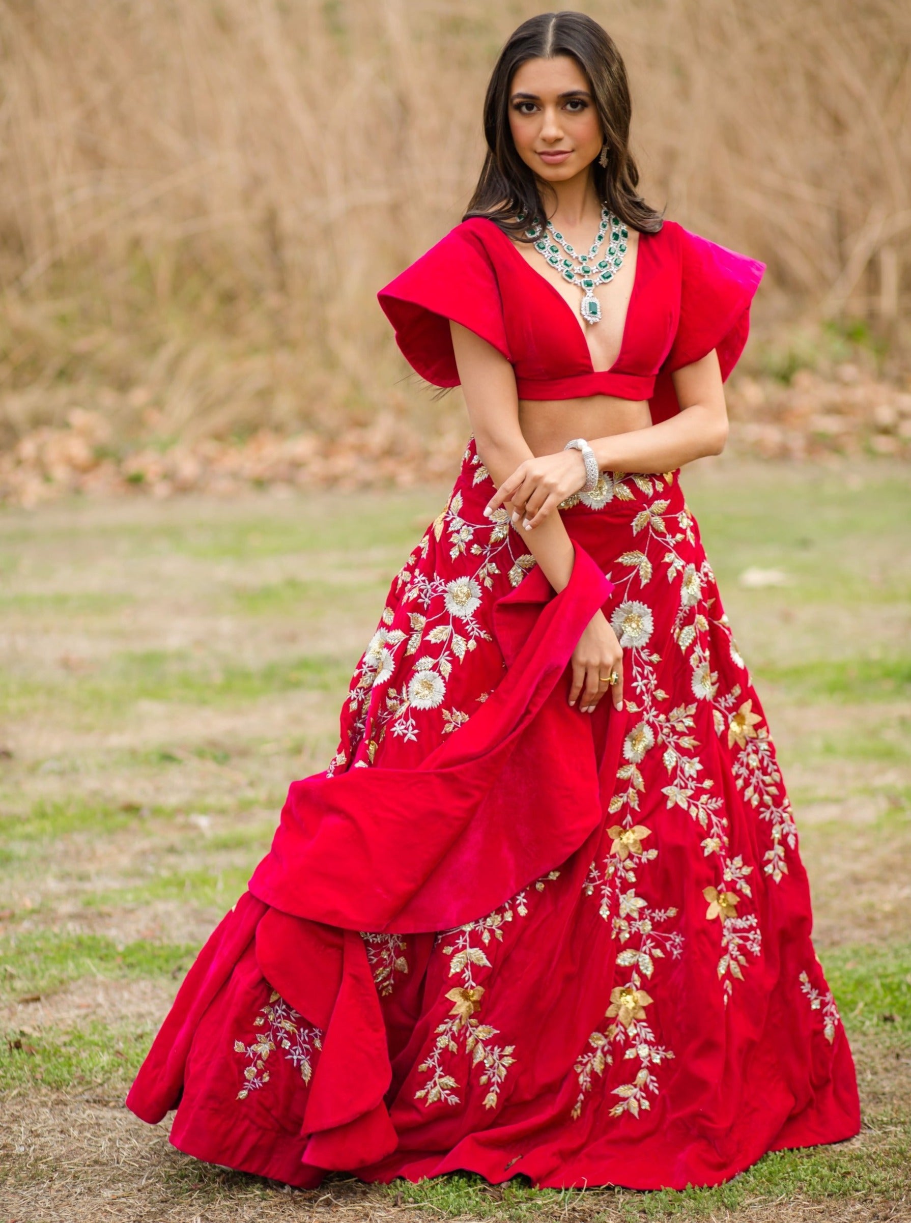 Hot pink Velvet Embroidered Lehenga choli with attached frill dupatta