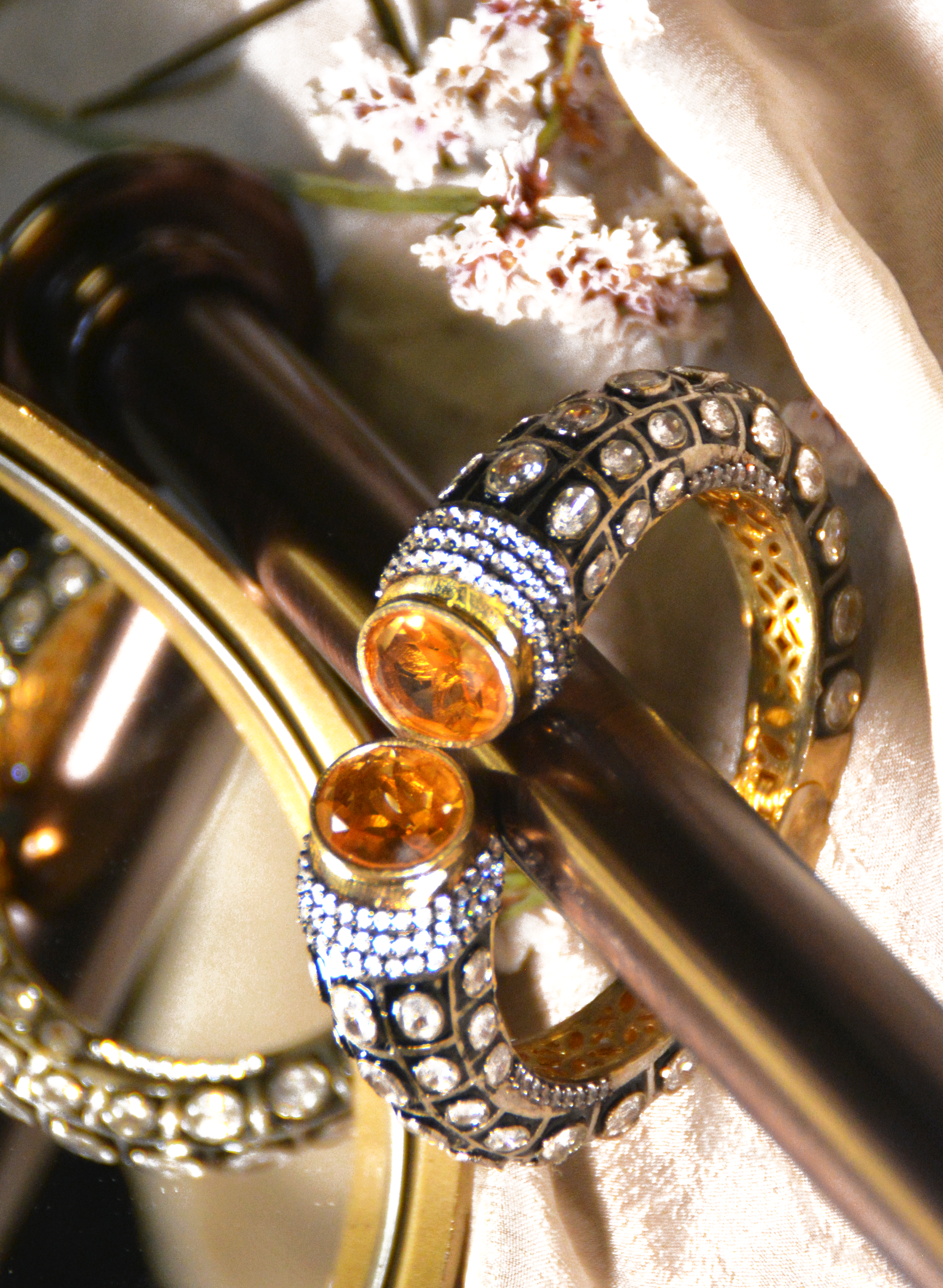 Traditional cuff bracelet with elegant yellow stone ends