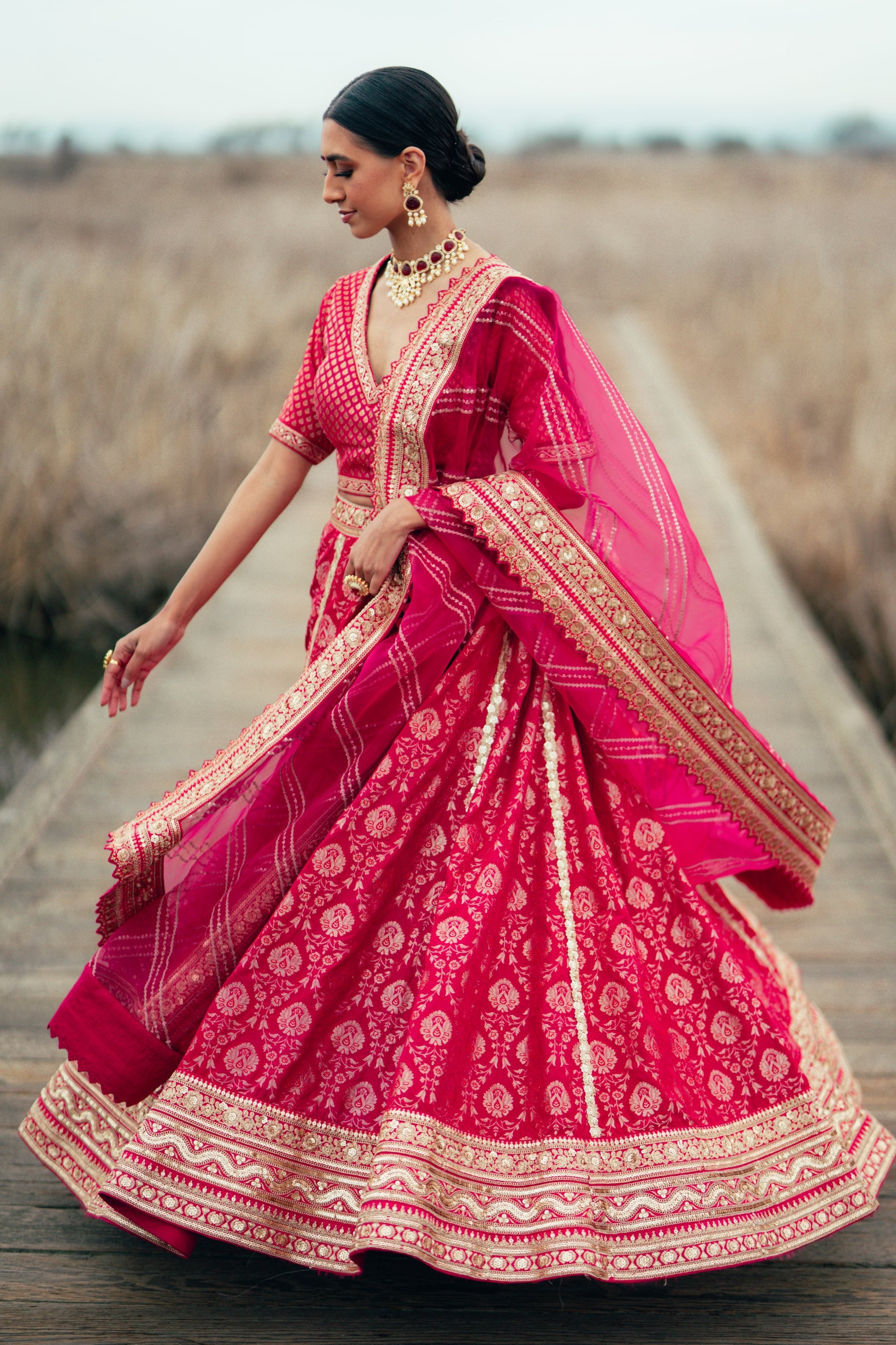 Traditional Fusia Pink Brocade Lehenga choli with embellished border