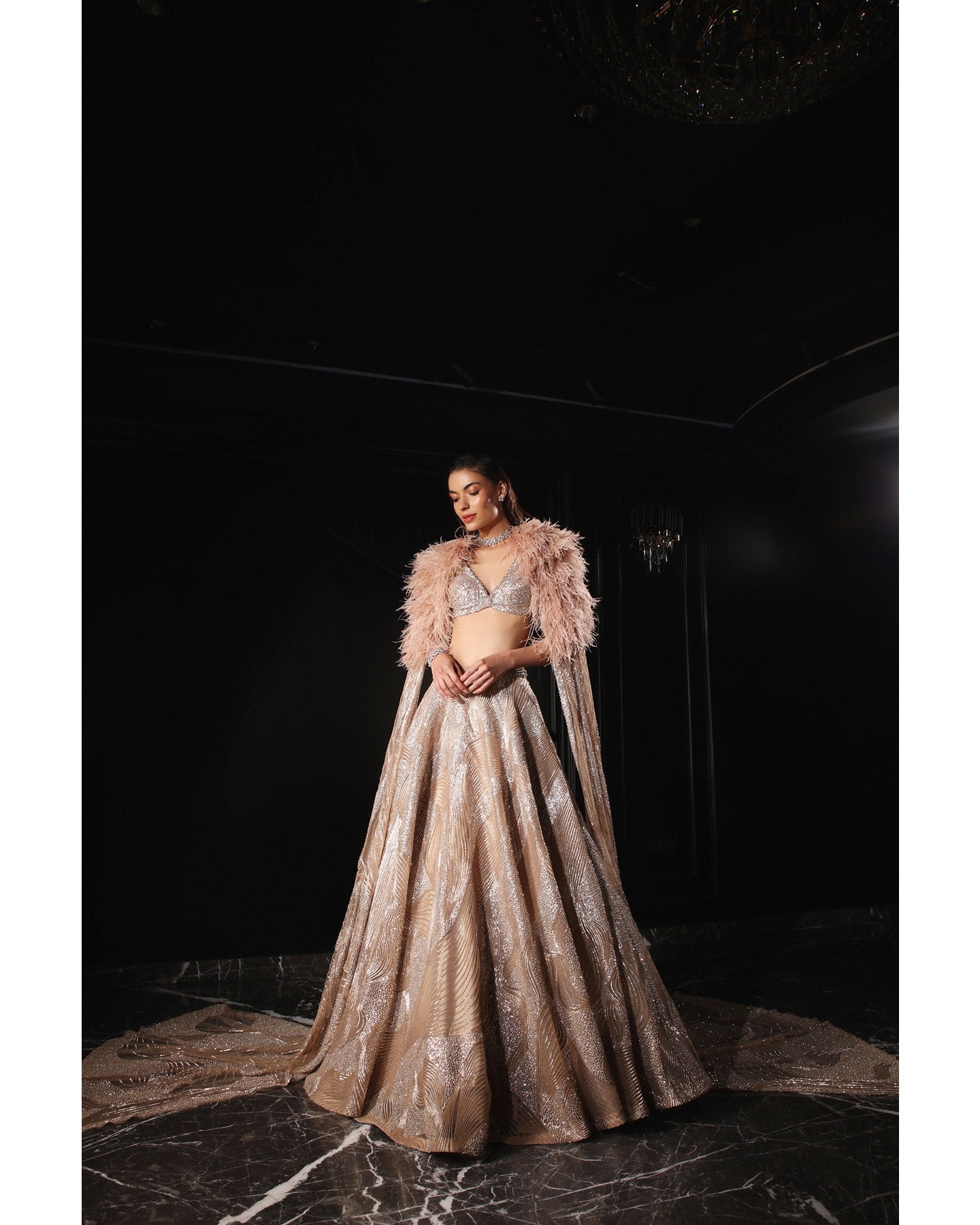 Elegance in every detail—our Light Coffee Brown Lehenga adorned with stones, crystals, sequins, and Japanese cut-dana creates a captivating symphony of sophistication.