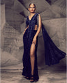 Draped in the enchanting allure of a slit saree, this ensemble redefines elegance with a contemporary twist.