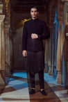 Sleek black V-shaped kurta with minimalist design