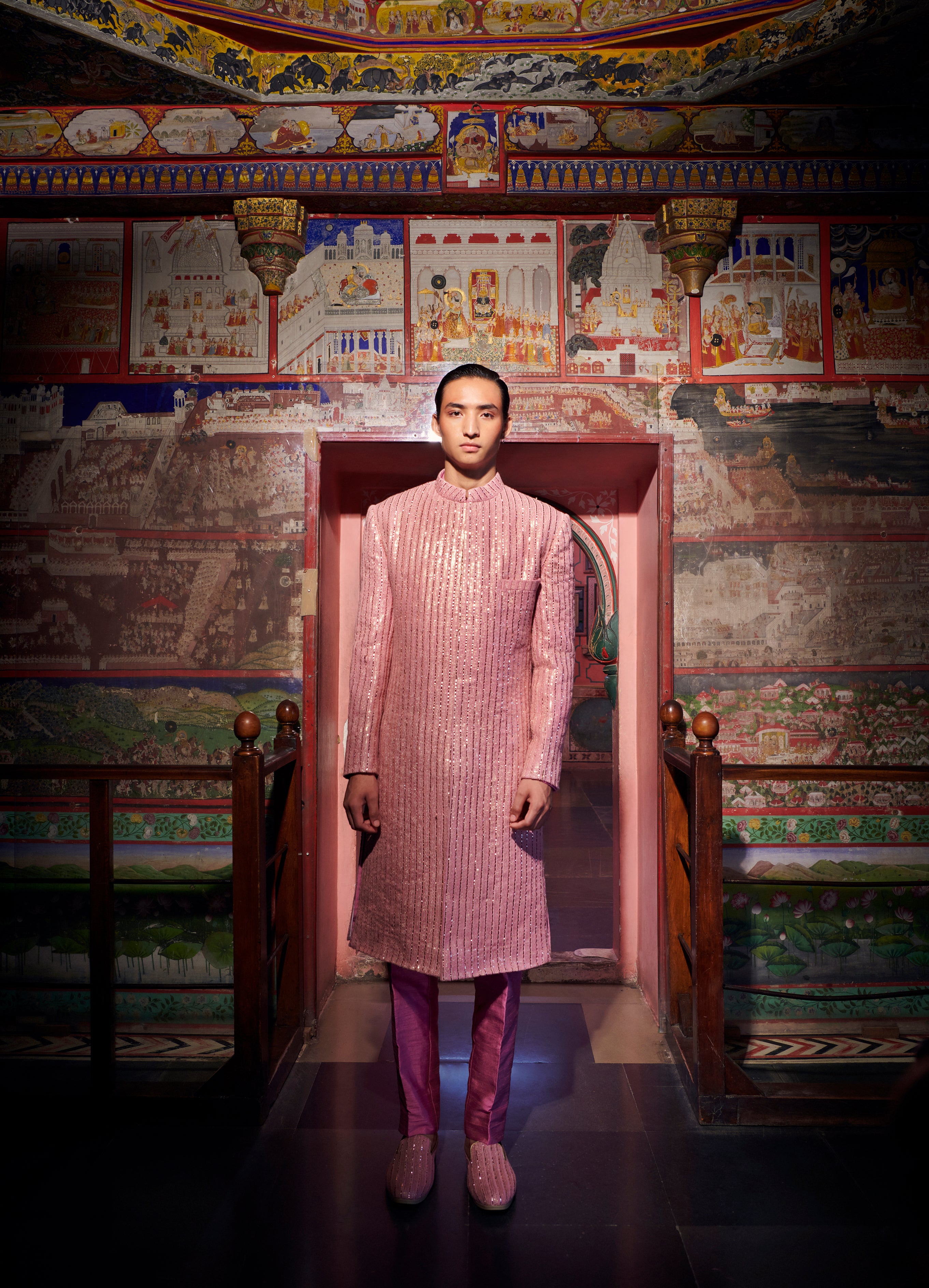 Embrace timeless elegance with our customizable Sherwani Set. Featuring intricate Mukaish work on the Sherwani, paired with a raw silk Kurta and Pant in a mesmerizing mauve hue. Make a statement that's uniquely yours, perfect for celebrating life's grandest moments in style. 