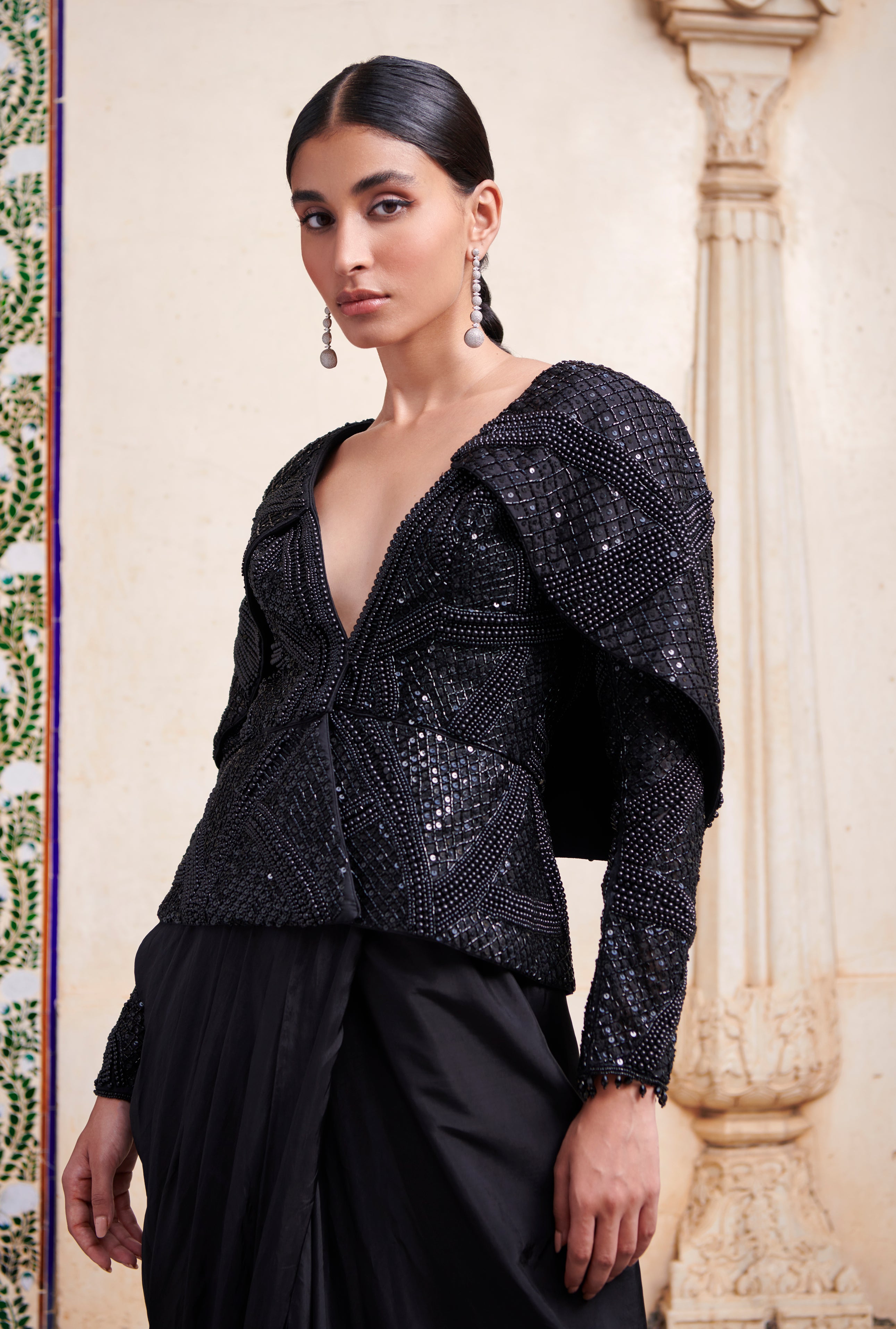 Sleek sophistication: Customize your style with this Linen Satin Lehenga and Habutai Silk Blouse combo.