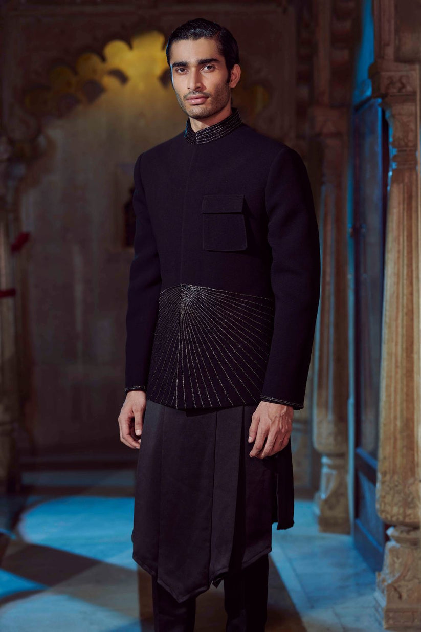 Elegant black V-shaped kurta featuring intricate embroidery